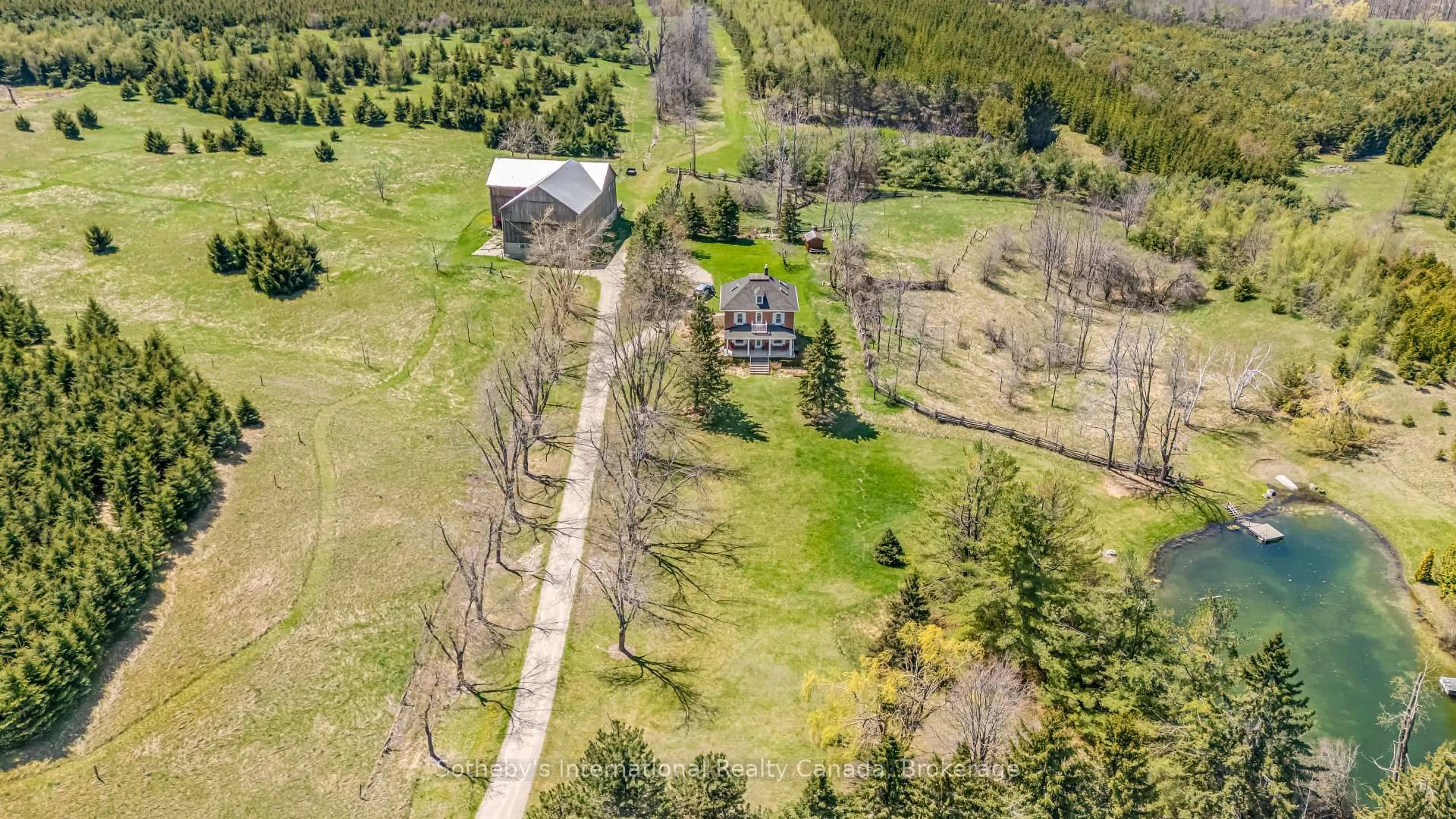 A pic from outside/outdoor area/front of a property/back of a property/a pic from drone, unknown for 717218 1st Line, Mulmur Ontario L9V 0G2