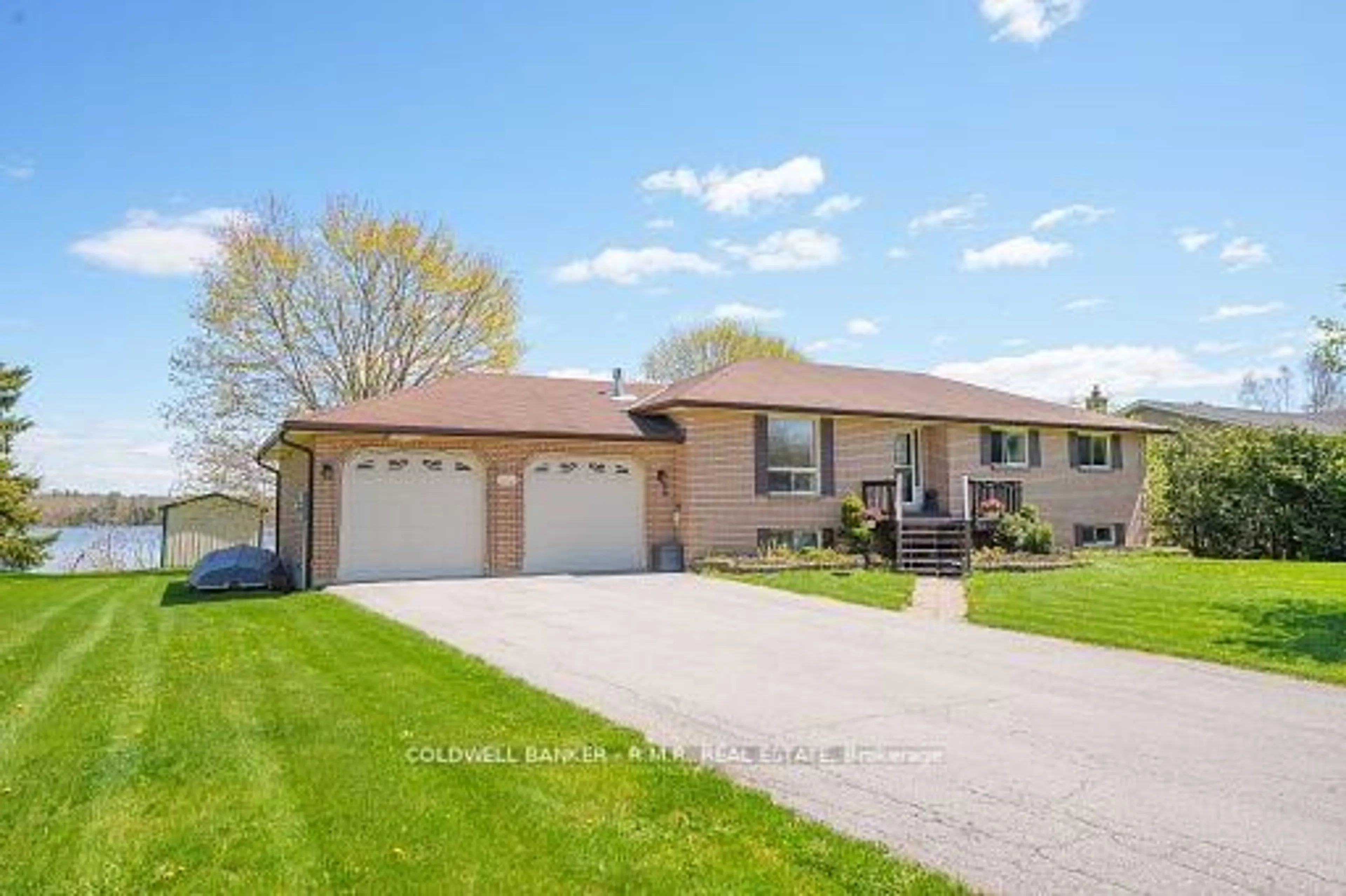 Home with vinyl exterior material, street for 84 Pinewood Blvd, Kawartha Lakes Ontario K0M 2T0