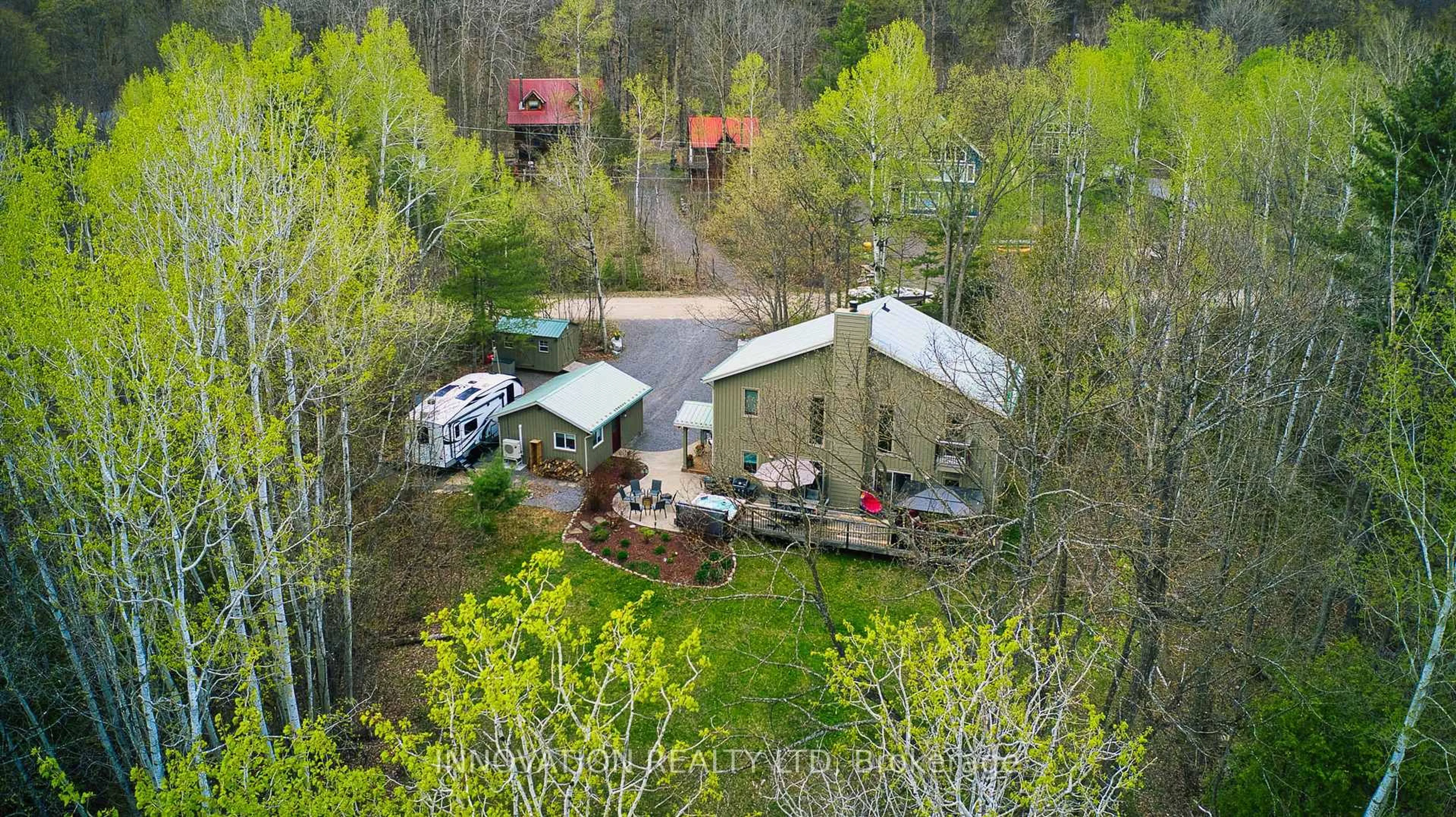 A pic from outside/outdoor area/front of a property/back of a property/a pic from drone, forest/trees view for 160 Viewmount Dr, Calabogie Ontario K0J 1H0