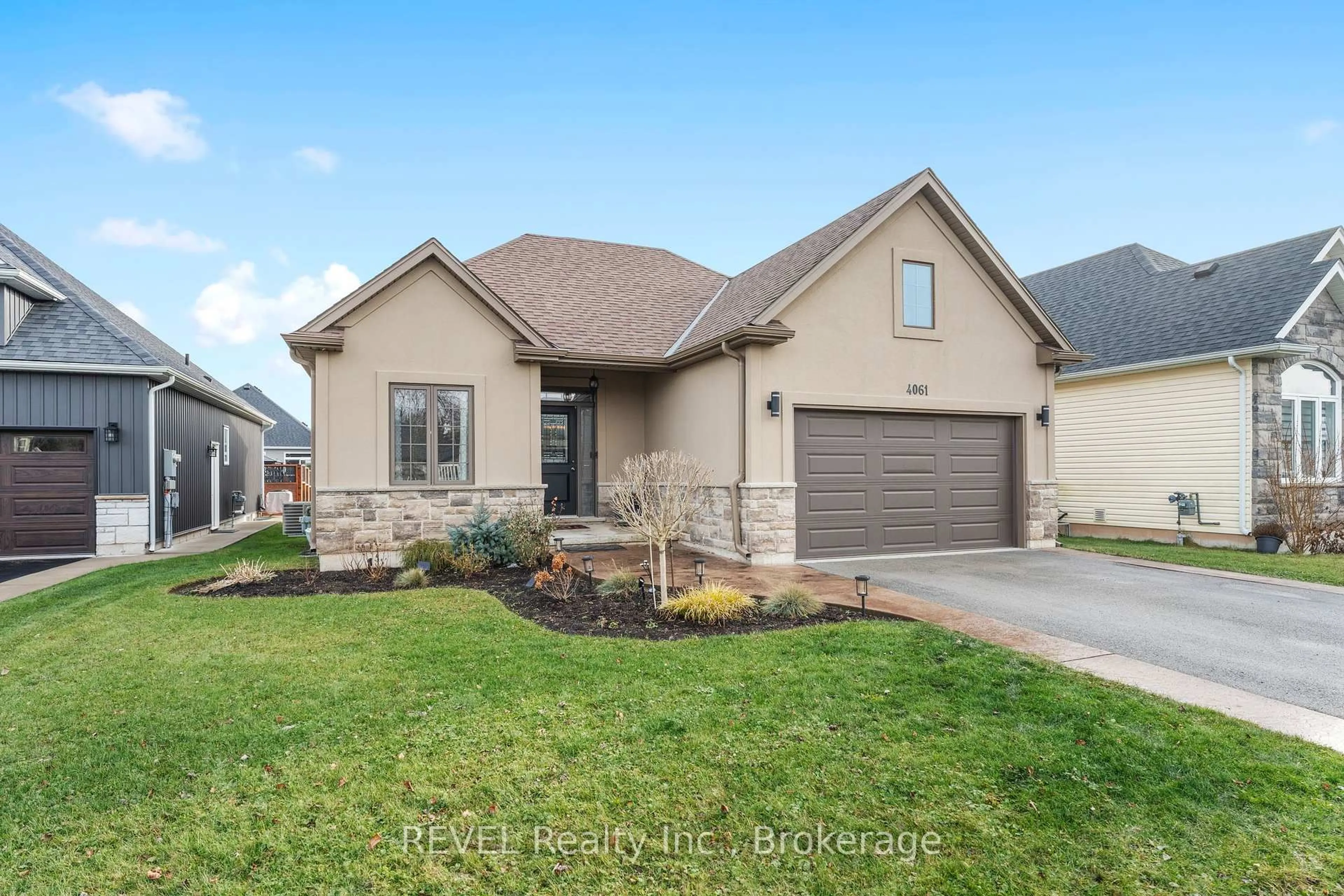 Home with brick exterior material, street for 4061 Village Creek Dr, Fort Erie Ontario L0S 1S0