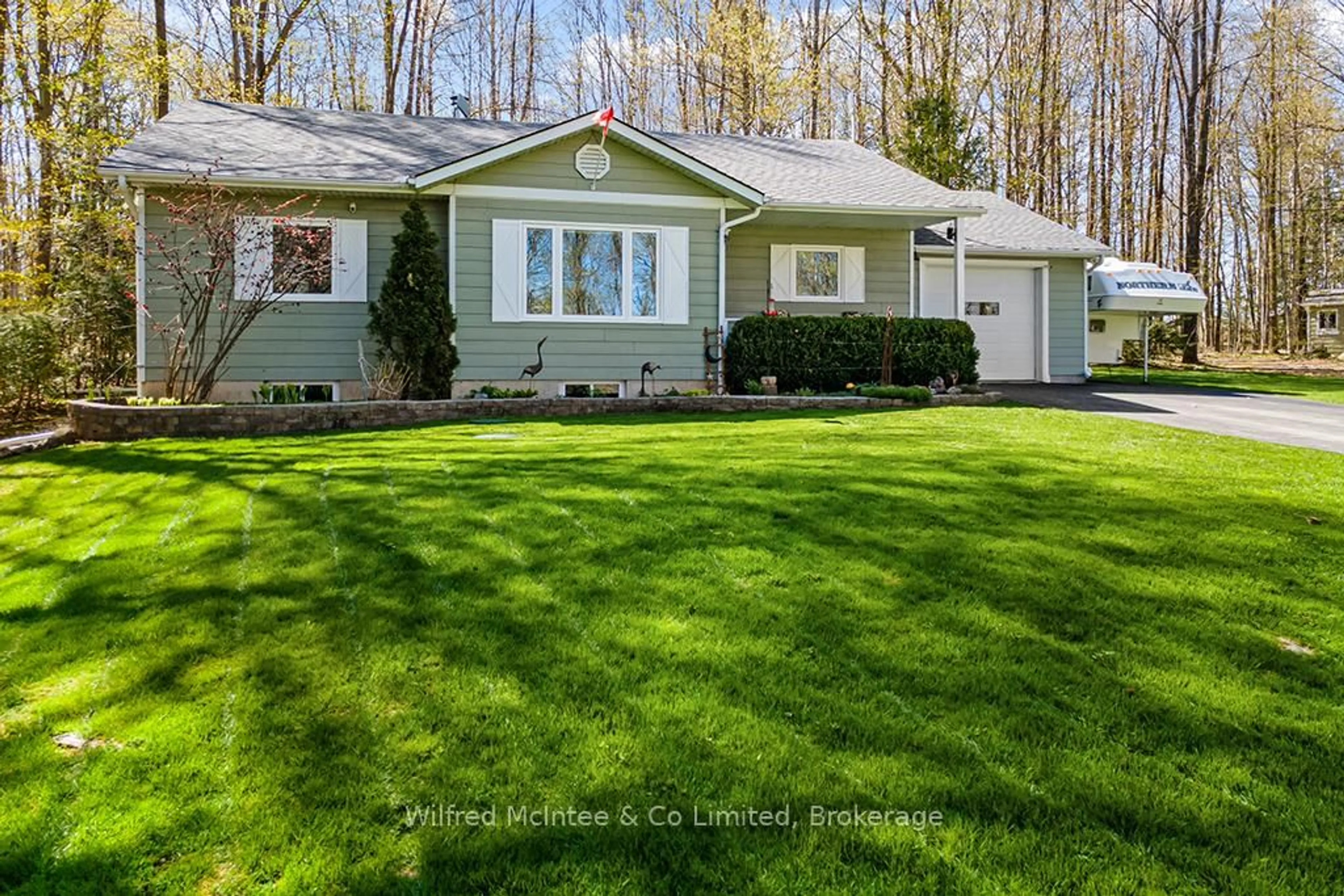 Home with vinyl exterior material, street for 24 Shore Dr, South Bruce Peninsula Ontario N0H 1A0