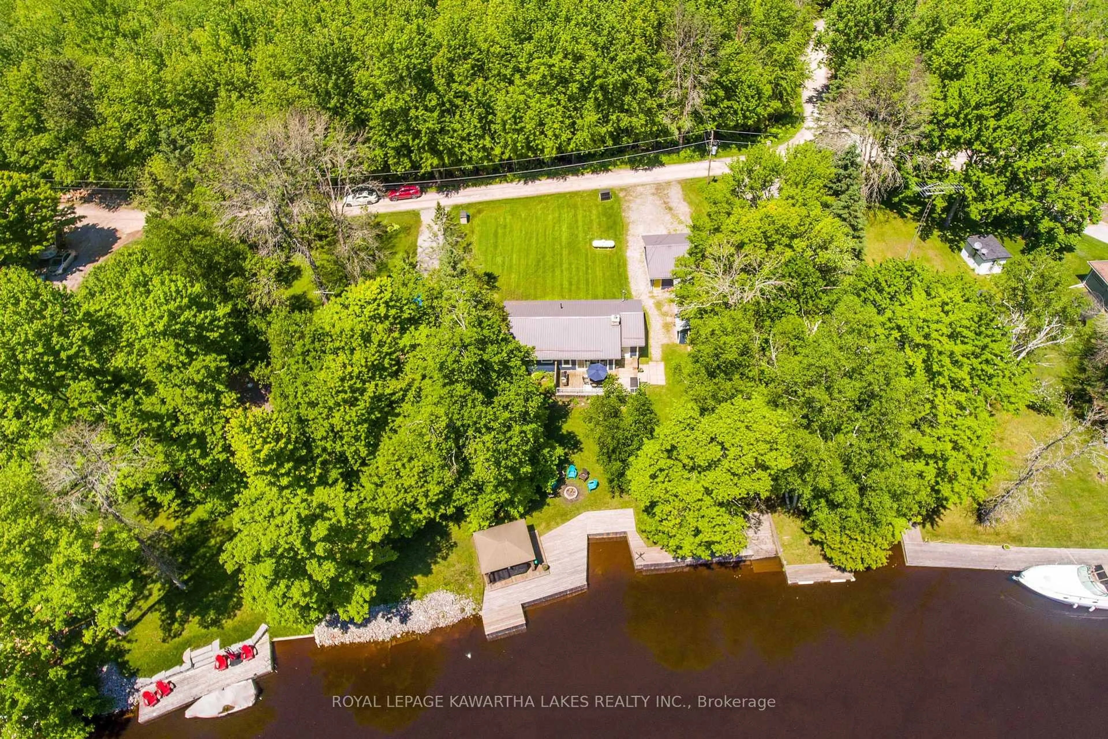 A pic from outside/outdoor area/front of a property/back of a property/a pic from drone, water/lake/river/ocean view for 117 Lenwil Rd, Kawartha Lakes Ontario K0M 1N0