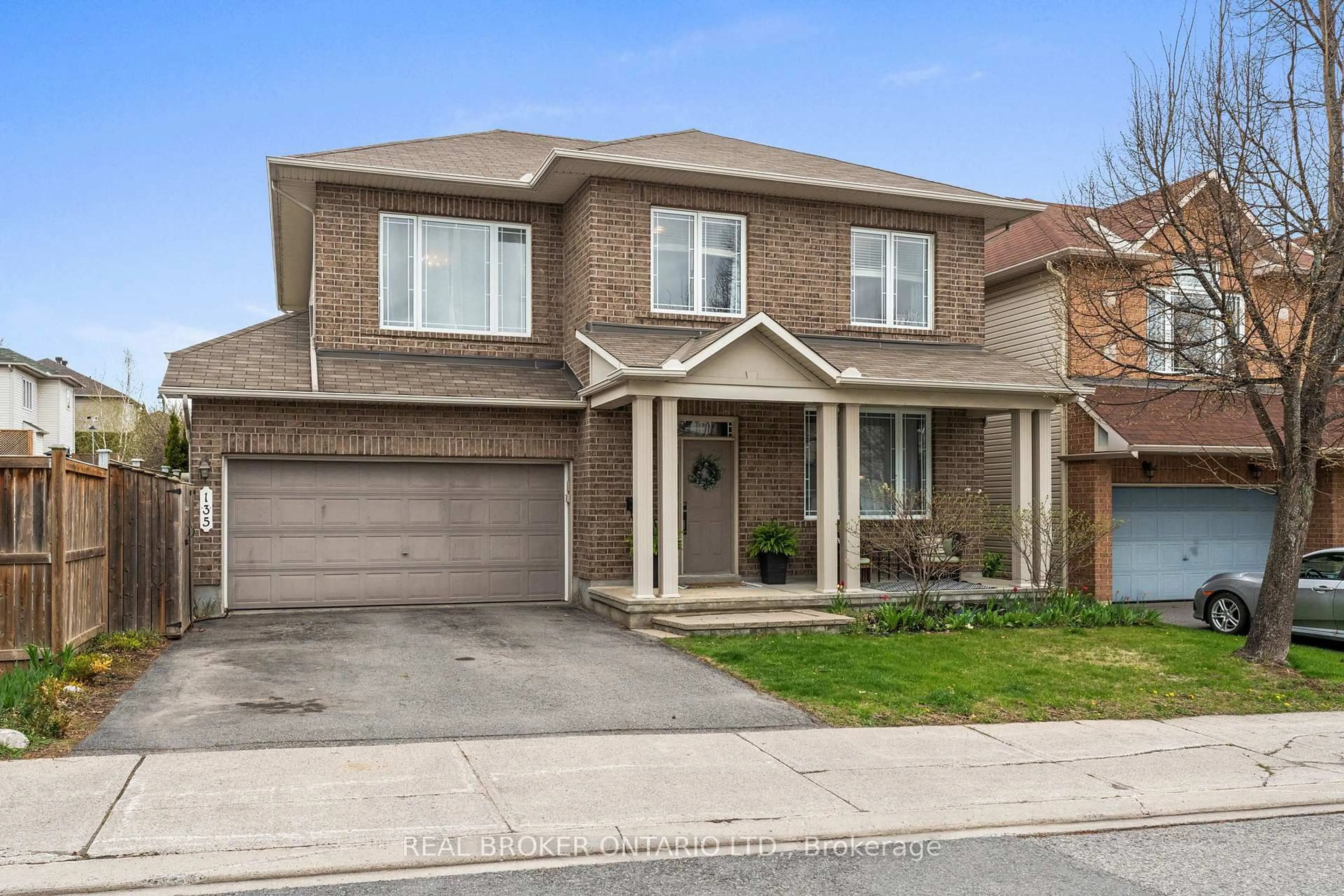 Home with brick exterior material, street for 135 Rocky Hill Dr, Ottawa Ontario K2G 7B2