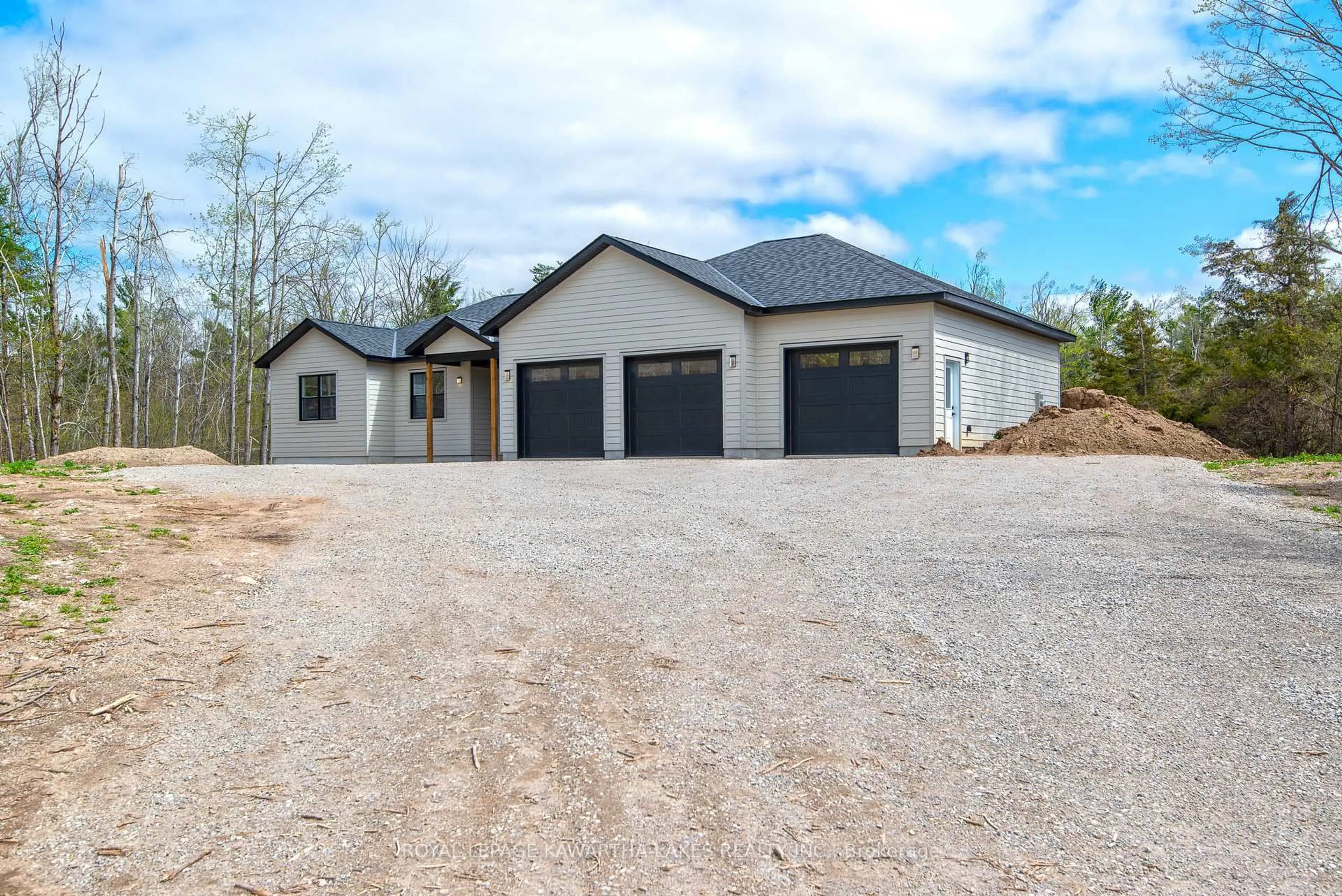Home with vinyl exterior material, street for 104 Moon Line Rd, Trent Lakes Ontario K0M 1A0