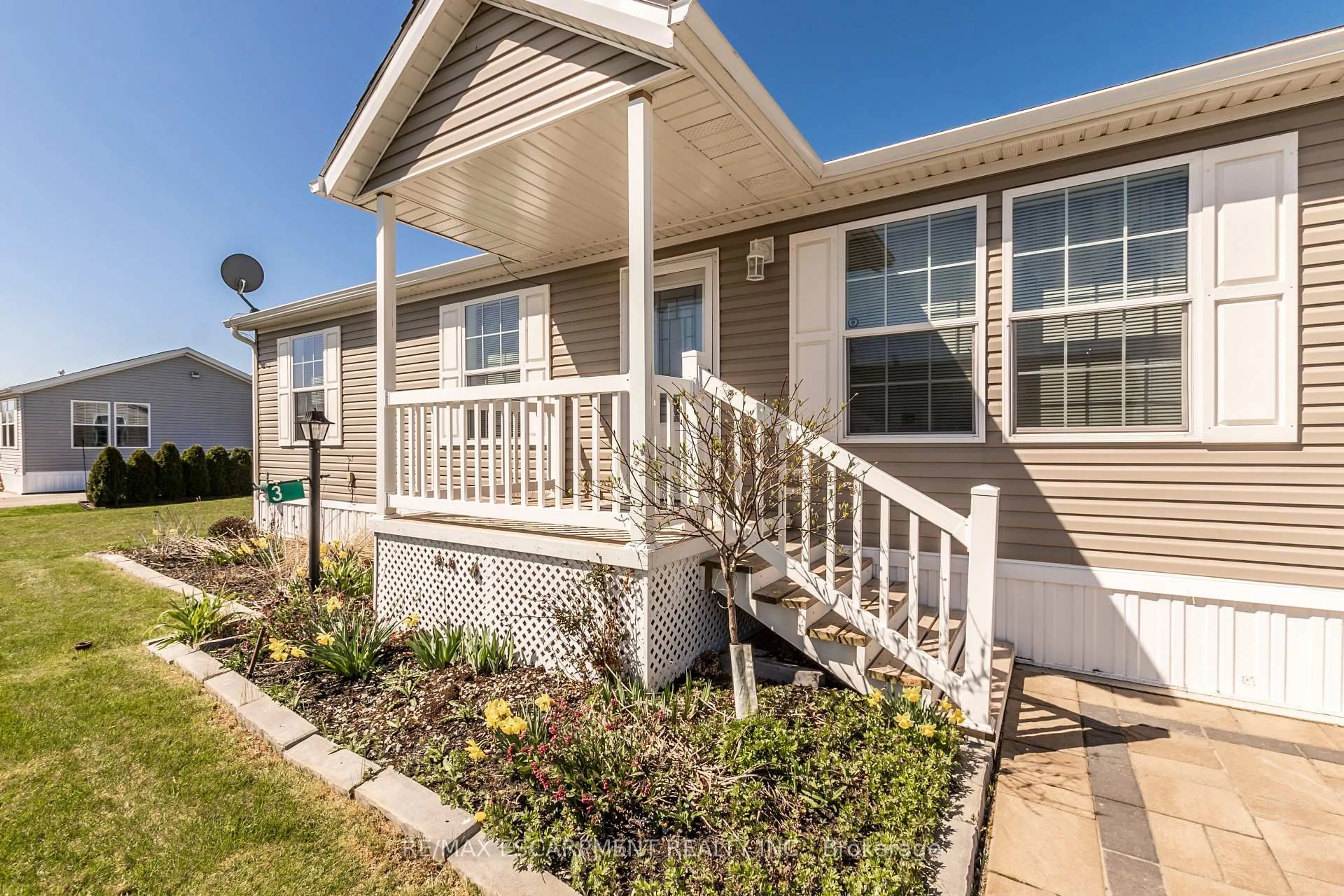 Home with vinyl exterior material, street for 3 Copper Beech Dr, Haldimand Ontario N0A 1L0
