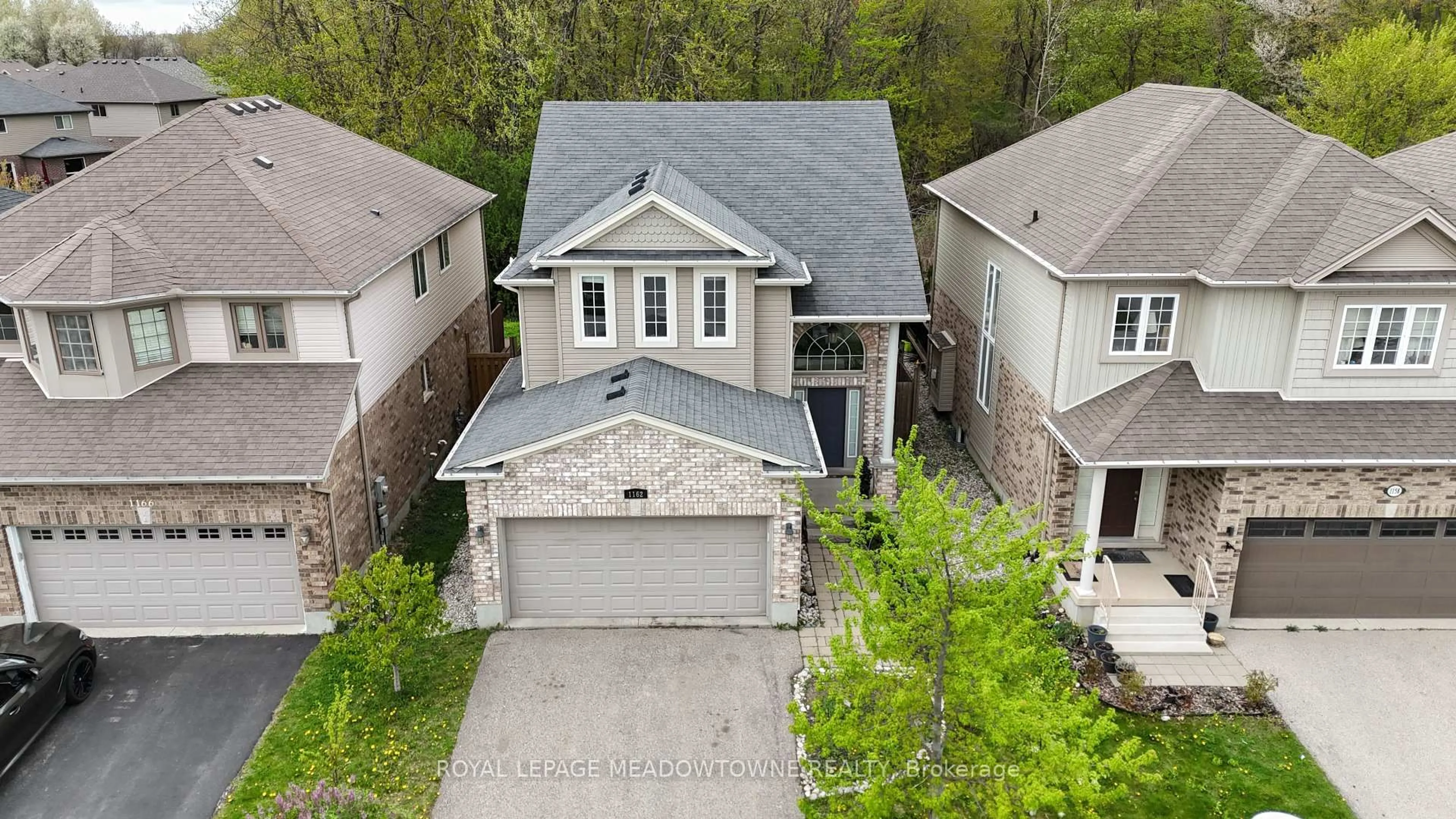 A pic from outside/outdoor area/front of a property/back of a property/a pic from drone, street for 1162 Smither Rd, London North Ontario N6G 5R8