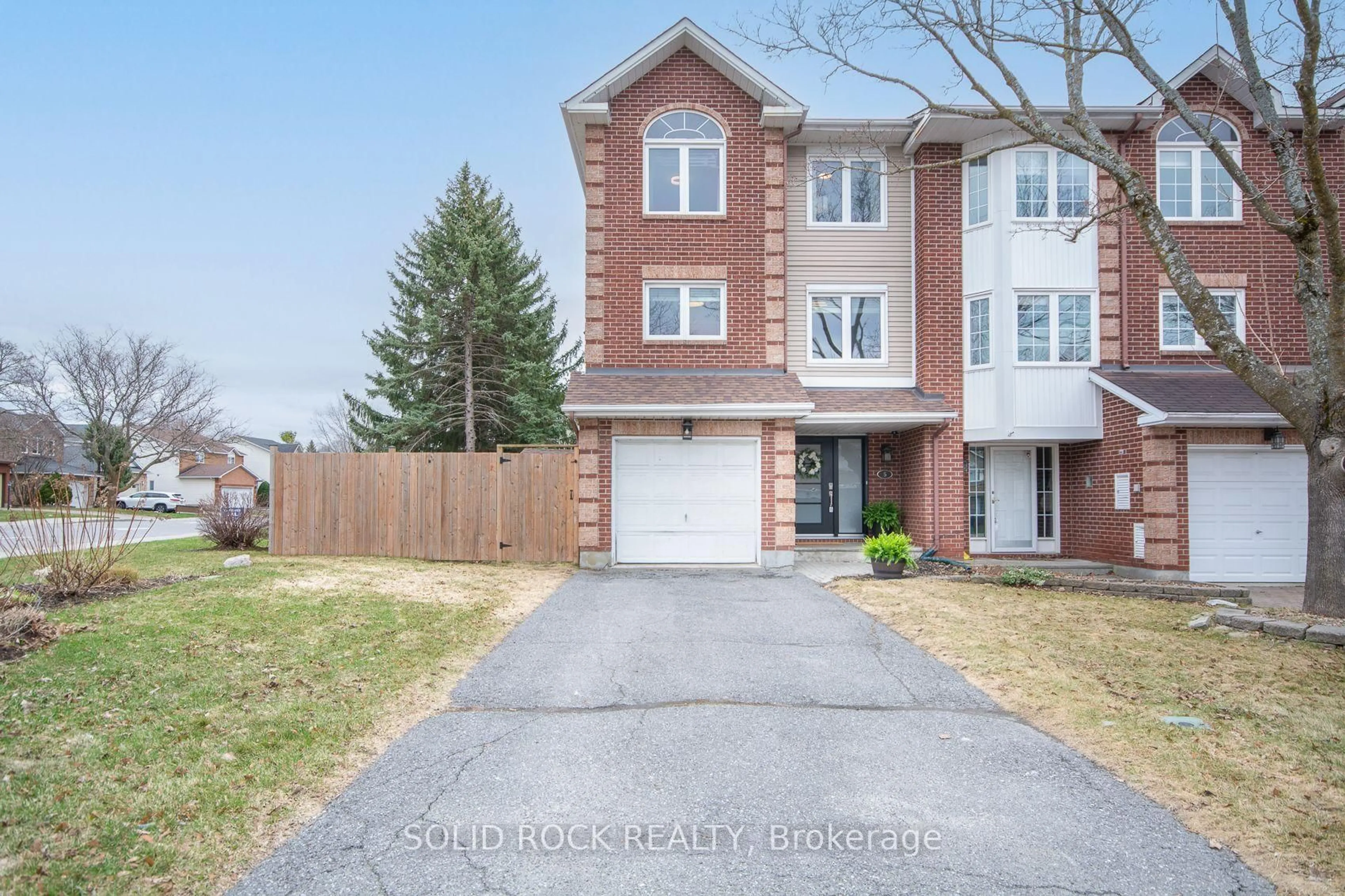 Home with brick exterior material, street for 5 Weybridge Dr, Ottawa Ontario K2J 4A1