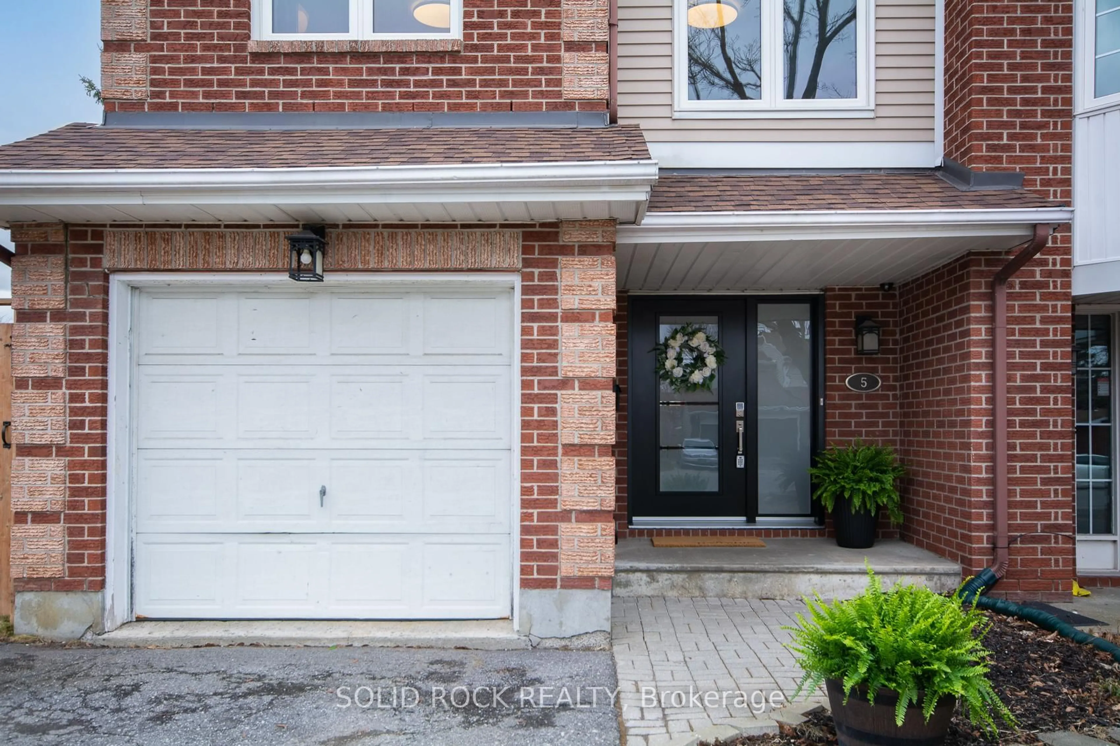 Home with brick exterior material, street for 5 Weybridge Dr, Ottawa Ontario K2J 4A1