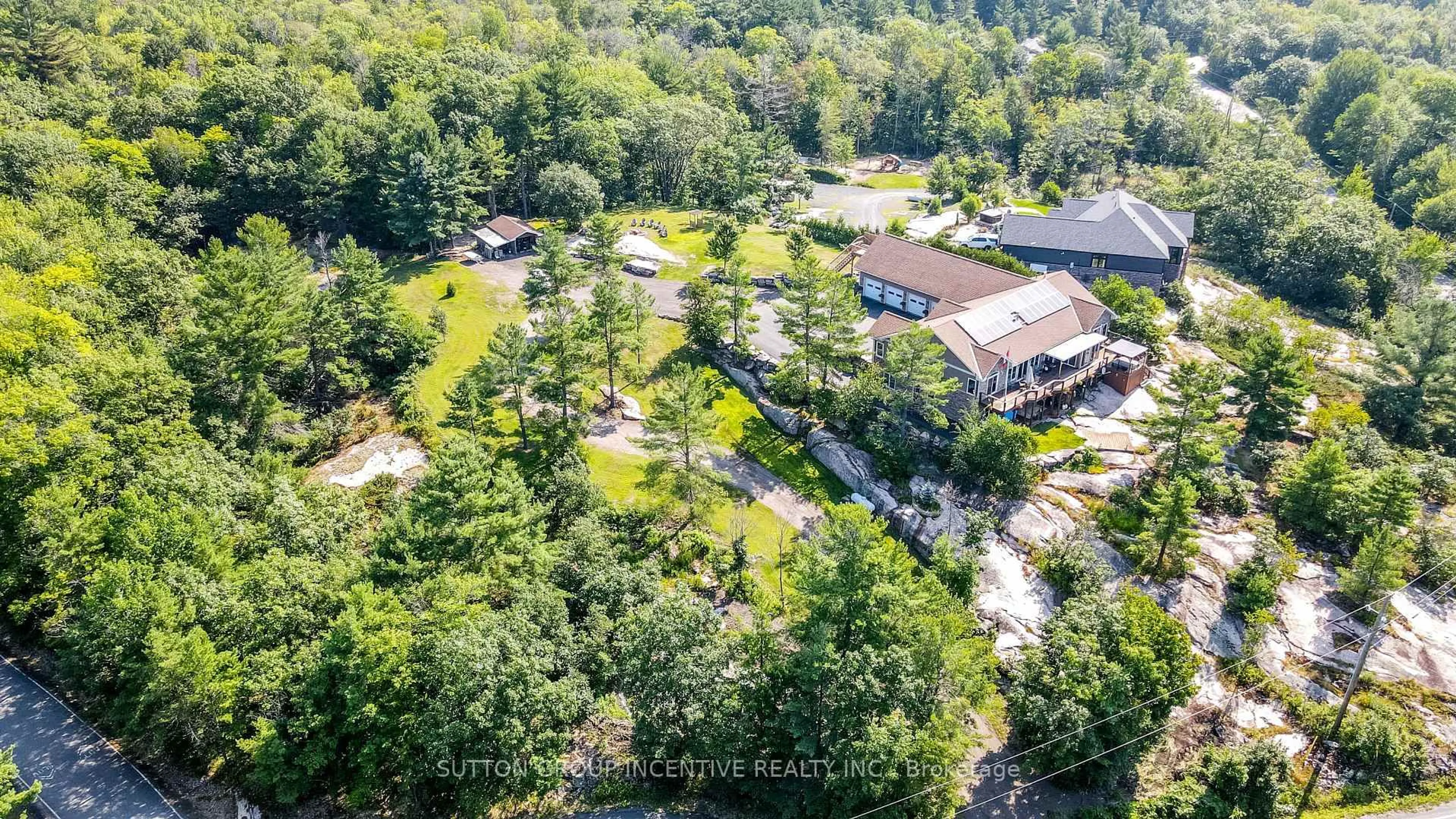 A pic from outside/outdoor area/front of a property/back of a property/a pic from drone, forest/trees view for 65 Big Sound Rd #Legal second suite, McDougall Ontario P0G 1G0