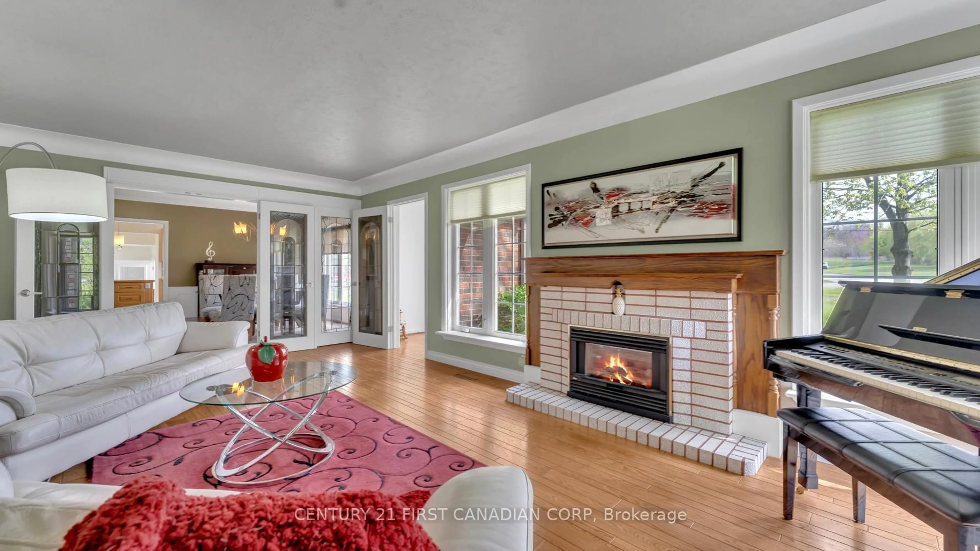 Living room with furniture, ceramic/tile floor for 8393 Longwoods Rd, London South Ontario N6P 1L3