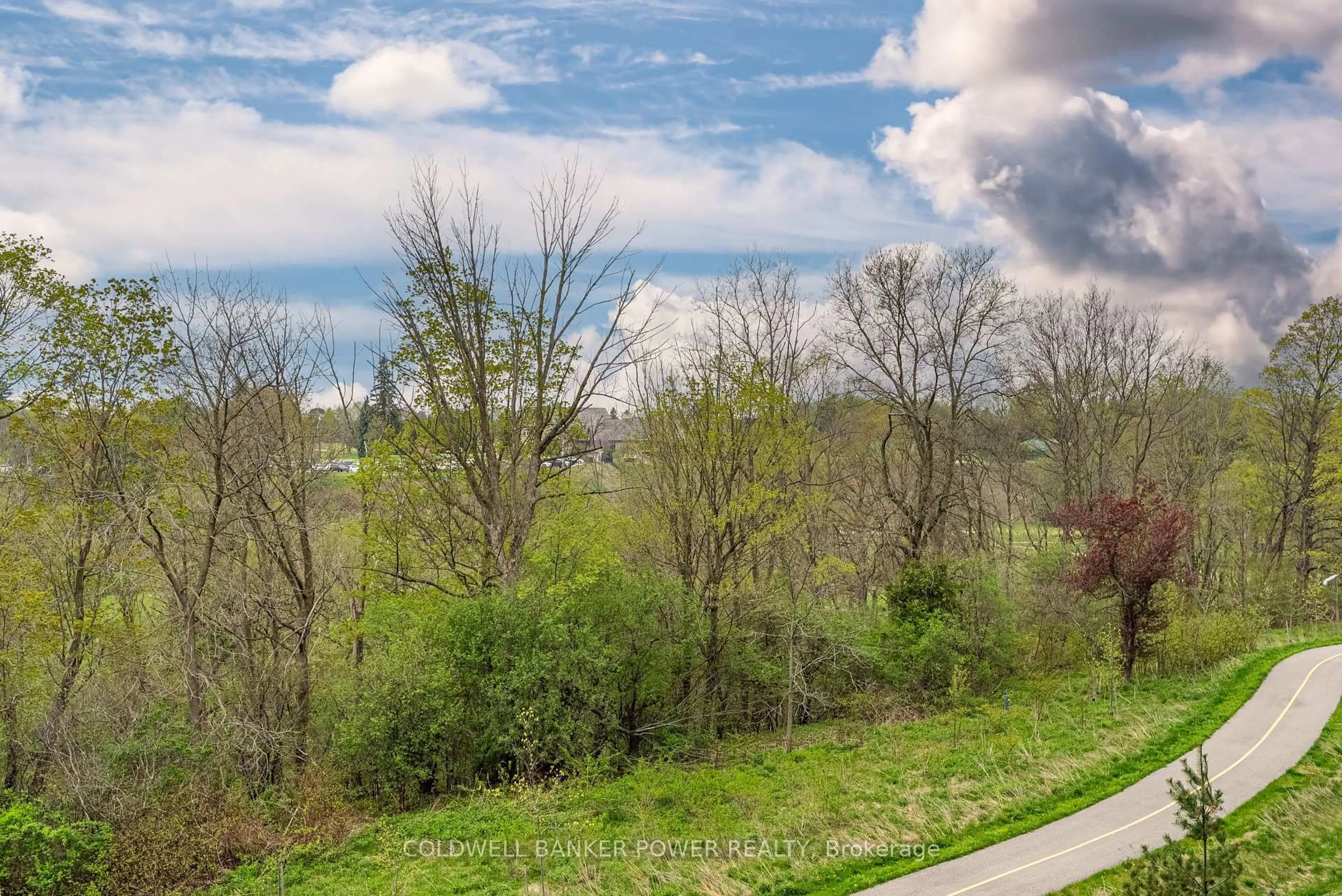 A pic from outside/outdoor area/front of a property/back of a property/a pic from drone, forest/trees view for 460 Callaway Rd #313, London North Ontario N6G 0Z2