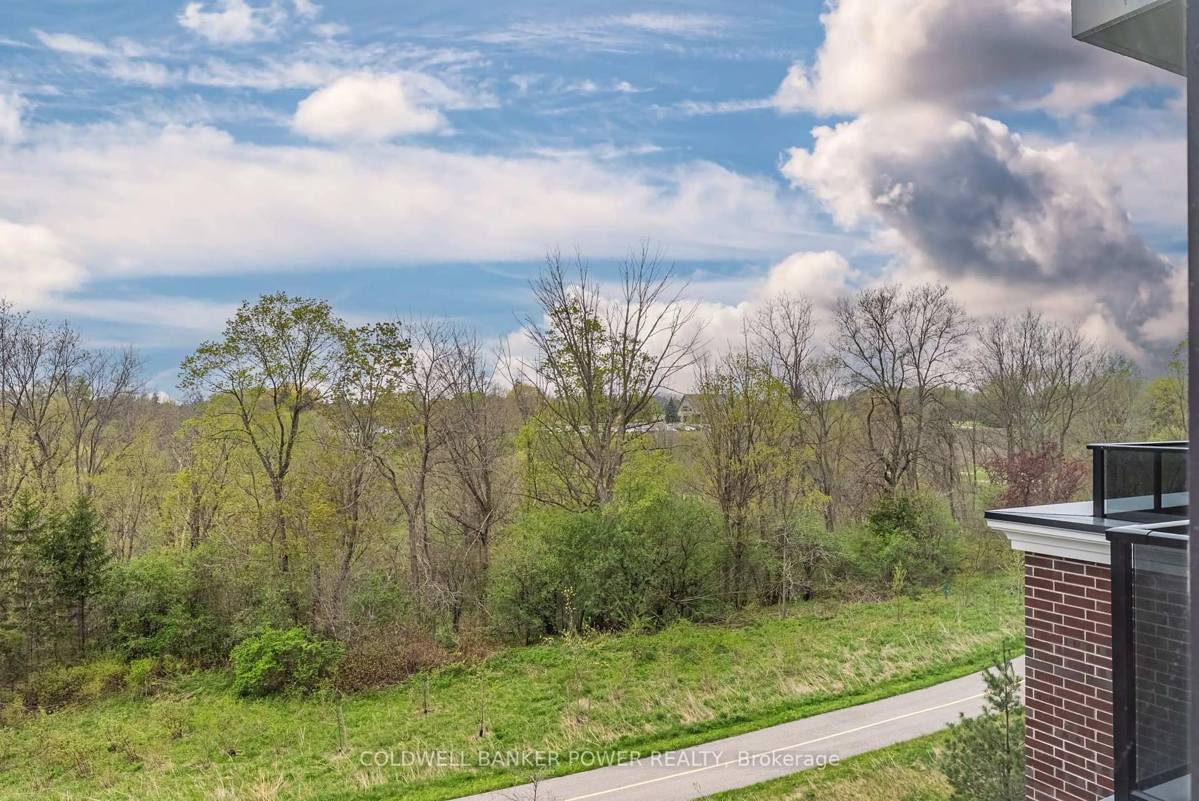 A pic from outside/outdoor area/front of a property/back of a property/a pic from drone, forest/trees view for 460 Callaway Rd #313, London North Ontario N6G 0Z2