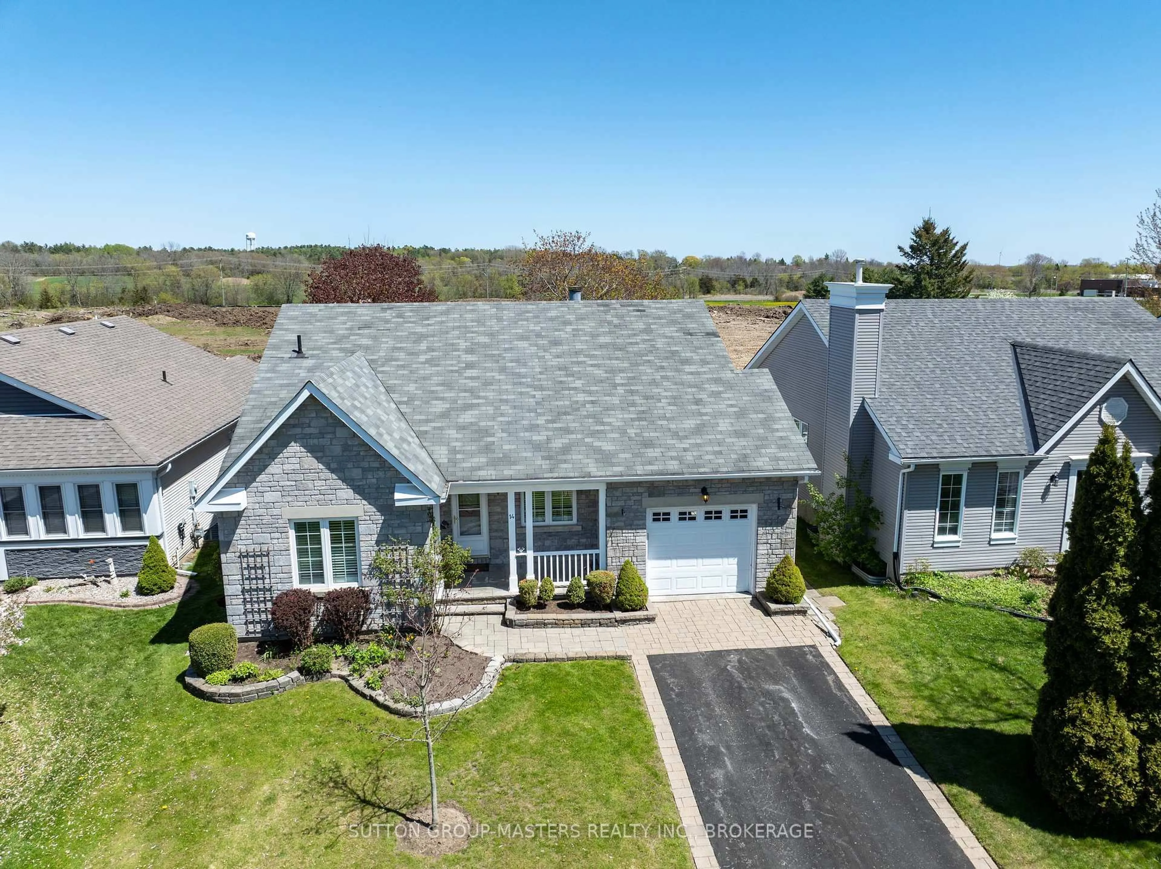 A pic from outside/outdoor area/front of a property/back of a property/a pic from drone, water/lake/river/ocean view for 14 Abbey Dawn Dr, Bath Ontario K0H 1G0