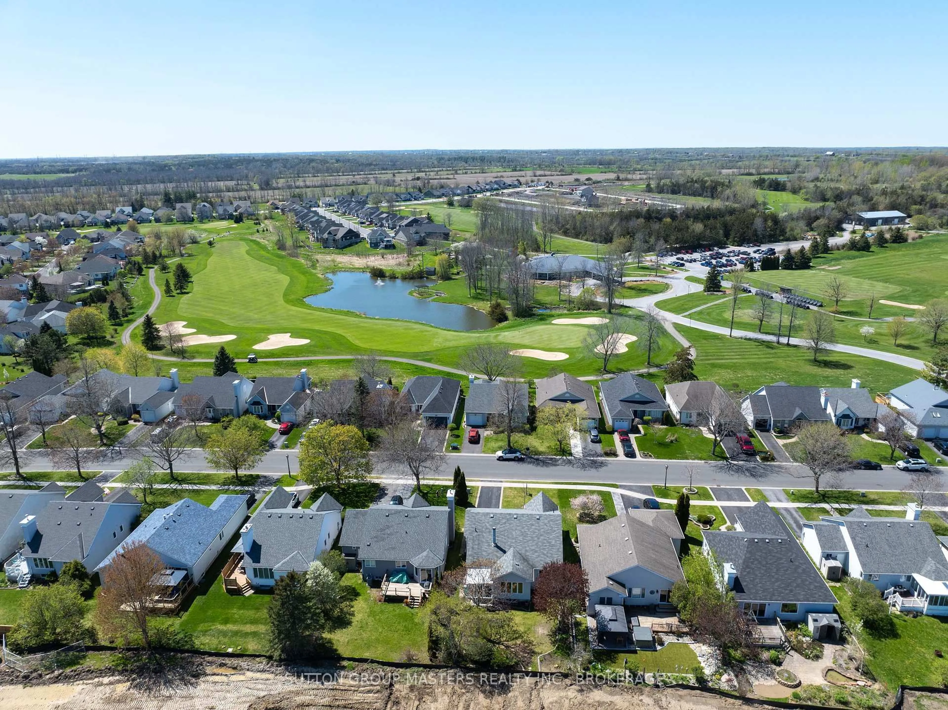 A pic from outside/outdoor area/front of a property/back of a property/a pic from drone, water/lake/river/ocean view for 14 Abbey Dawn Dr, Bath Ontario K0H 1G0