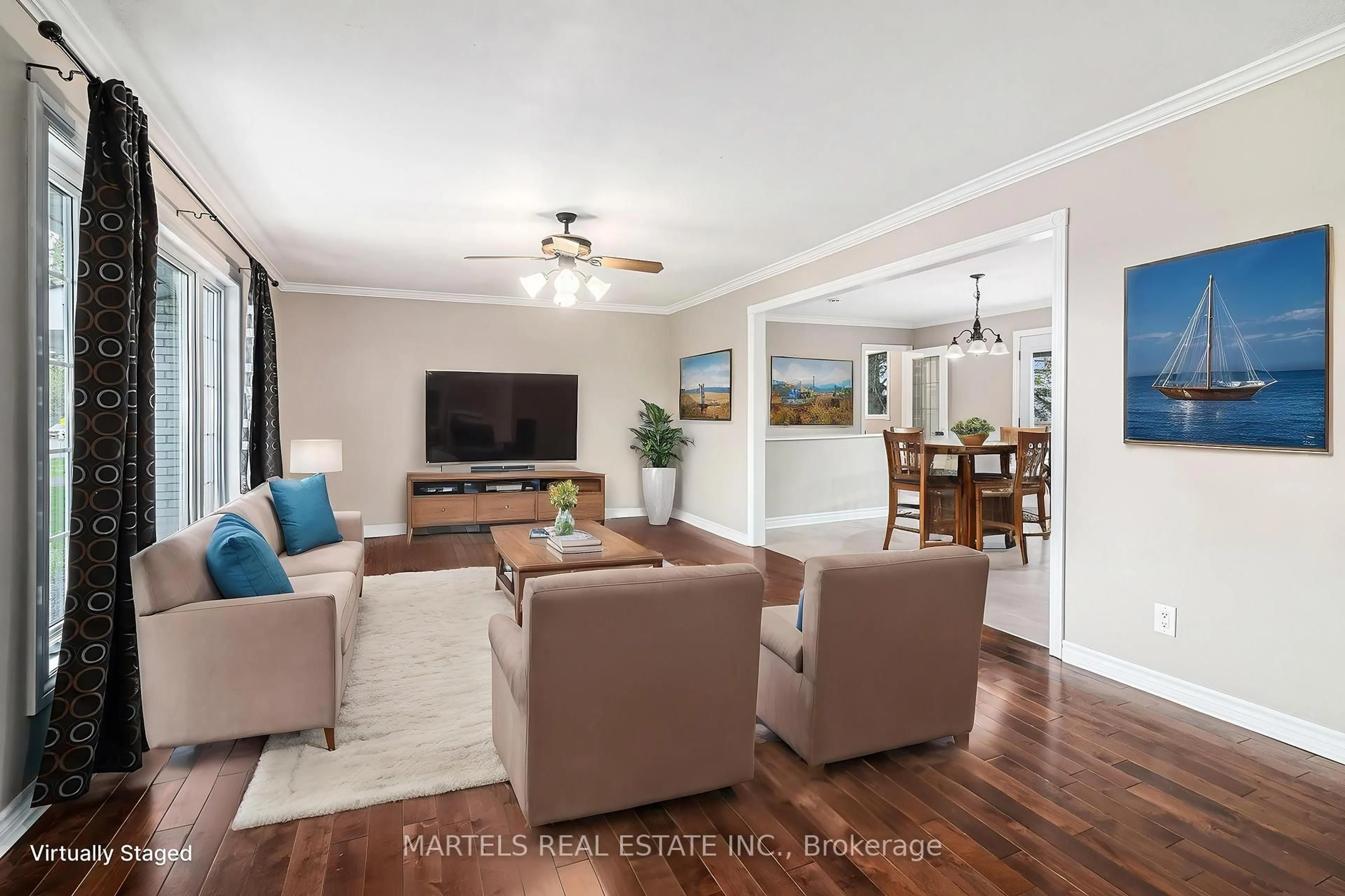 Living room with furniture, wood/laminate floor for 3268 Principale St, Alfred and Plantagenet Ontario K0A 3K0