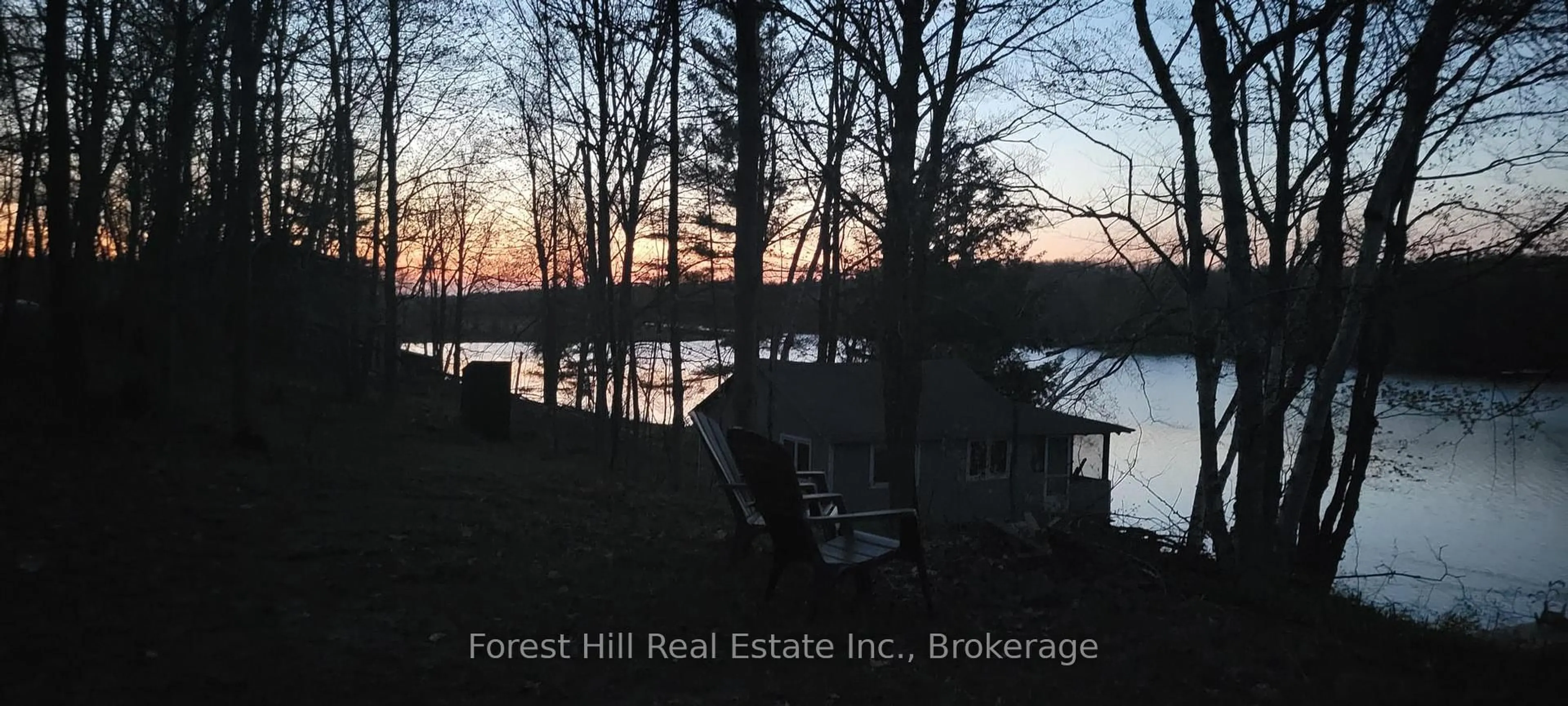 A pic from outside/outdoor area/front of a property/back of a property/a pic from drone, forest/trees view for 4534 Southwood Rd ##5, Muskoka Lakes Ontario P0C 1M0