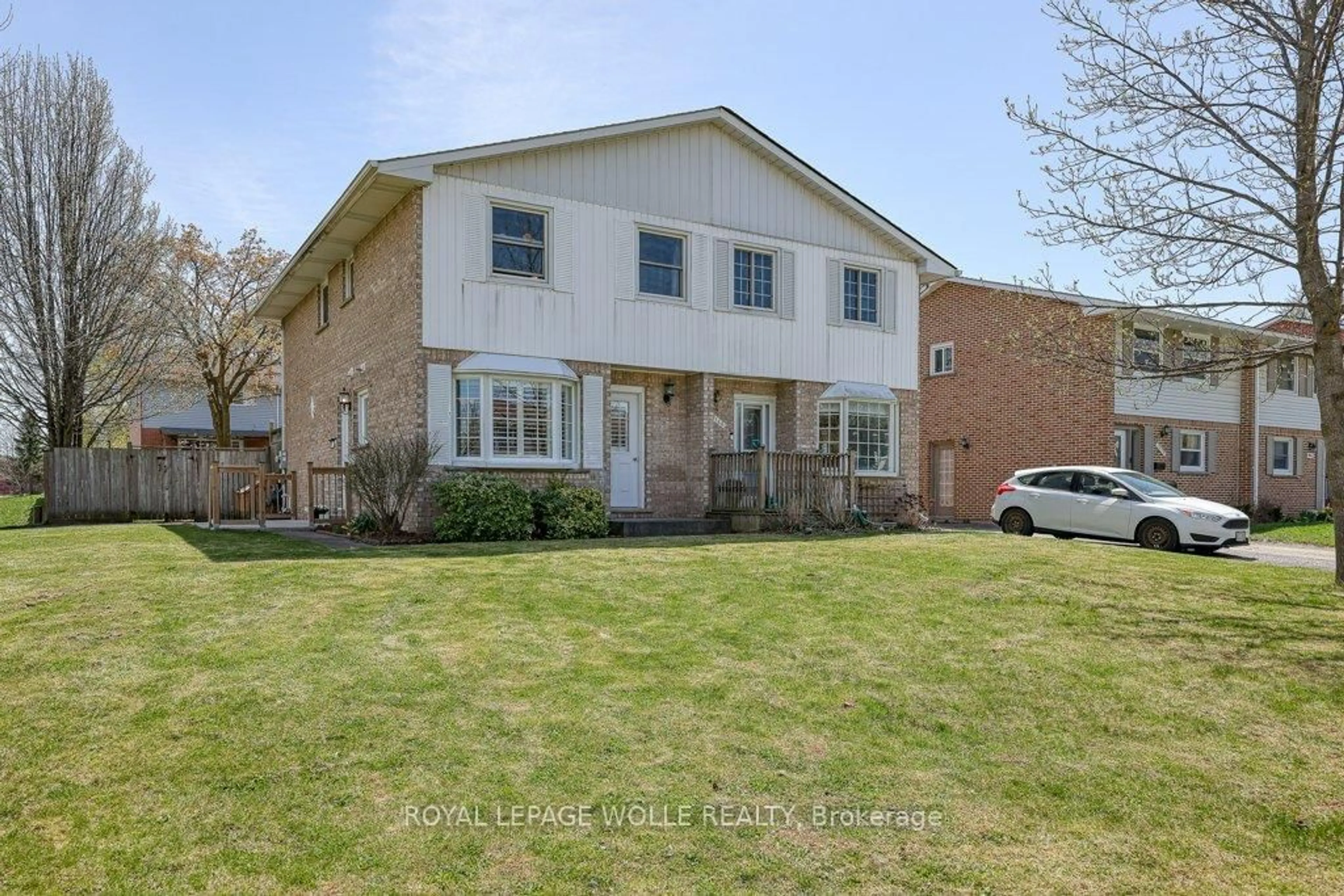 Home with brick exterior material, street for 1014B Nesbitt Cres, Woodstock Ontario N4S 7P1