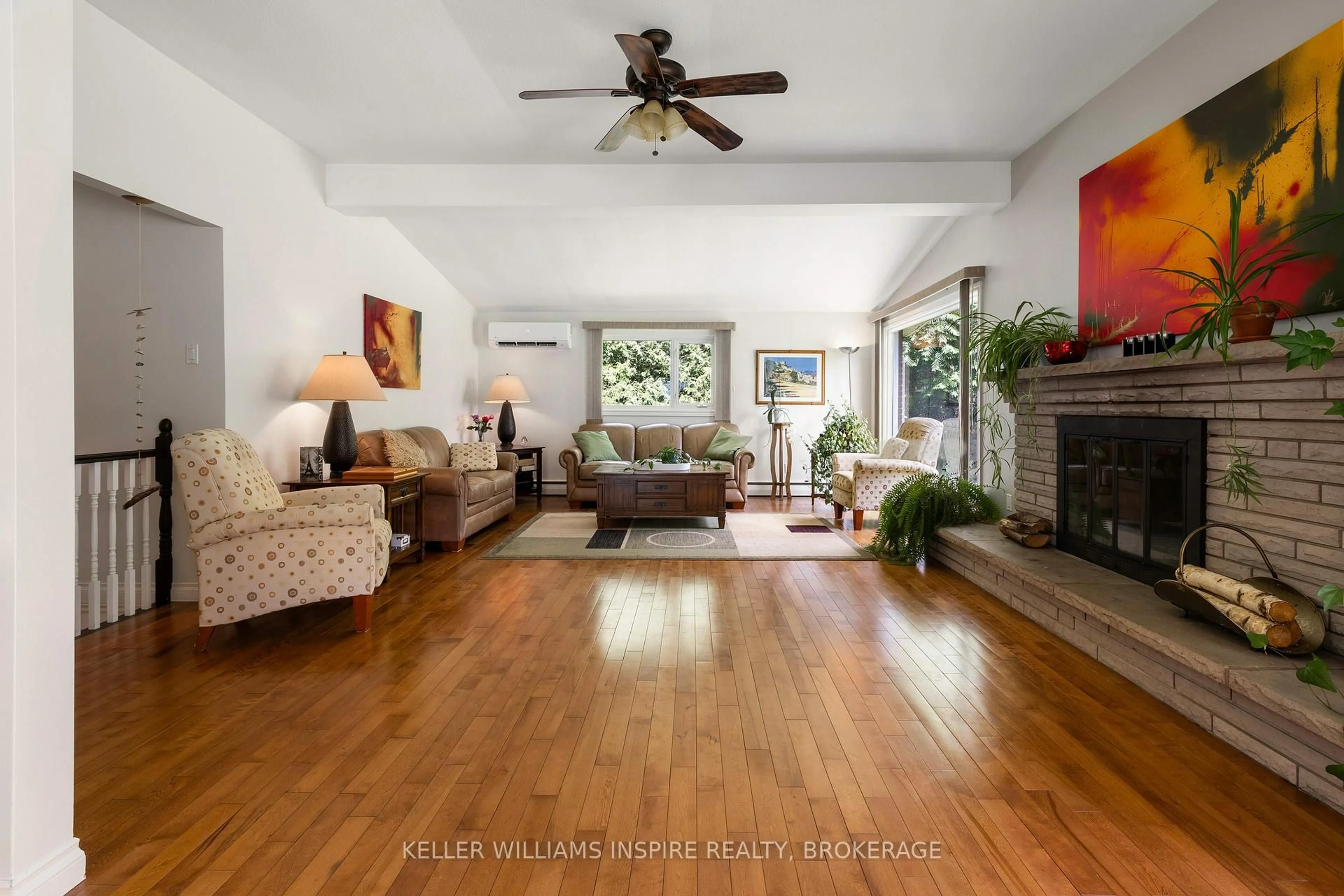 Living room with furniture, wood/laminate floor for 3 Helena Pl, Kingston Ontario K7L 4V1