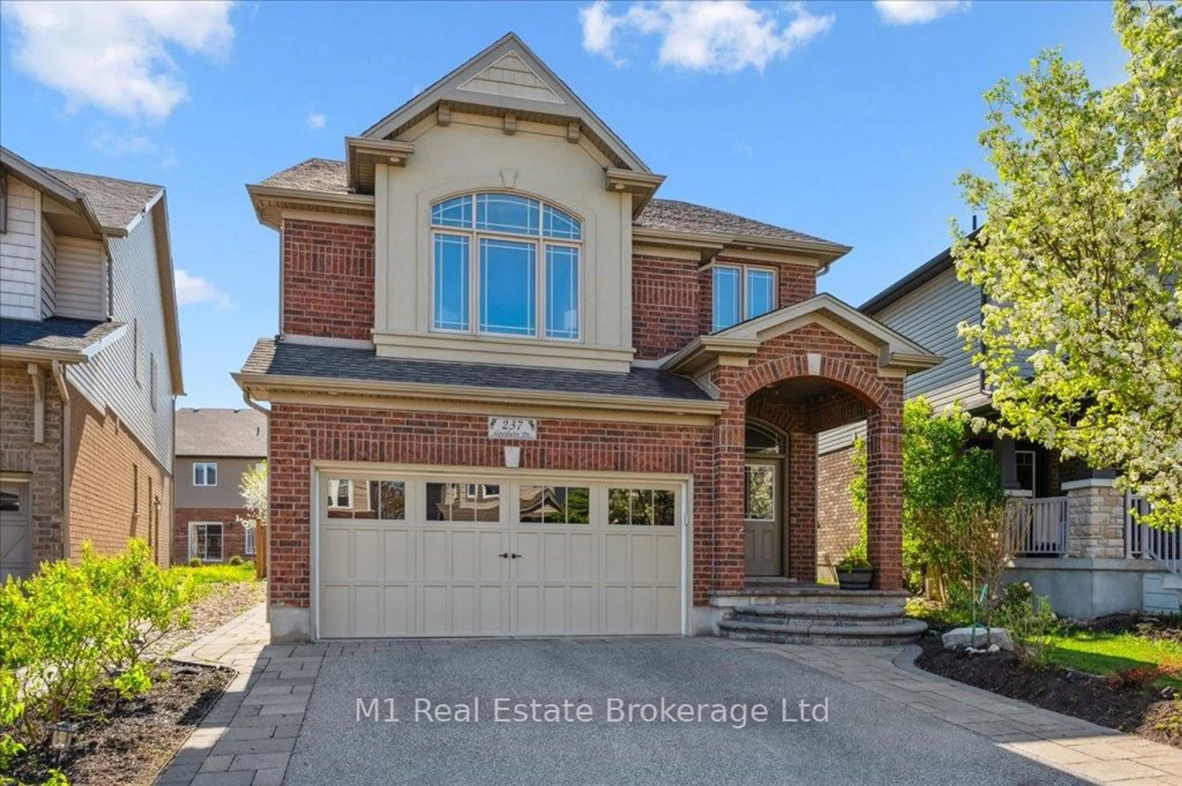 Home with brick exterior material, street for 237 Goodwin Dr, Guelph Ontario N1L 0K1