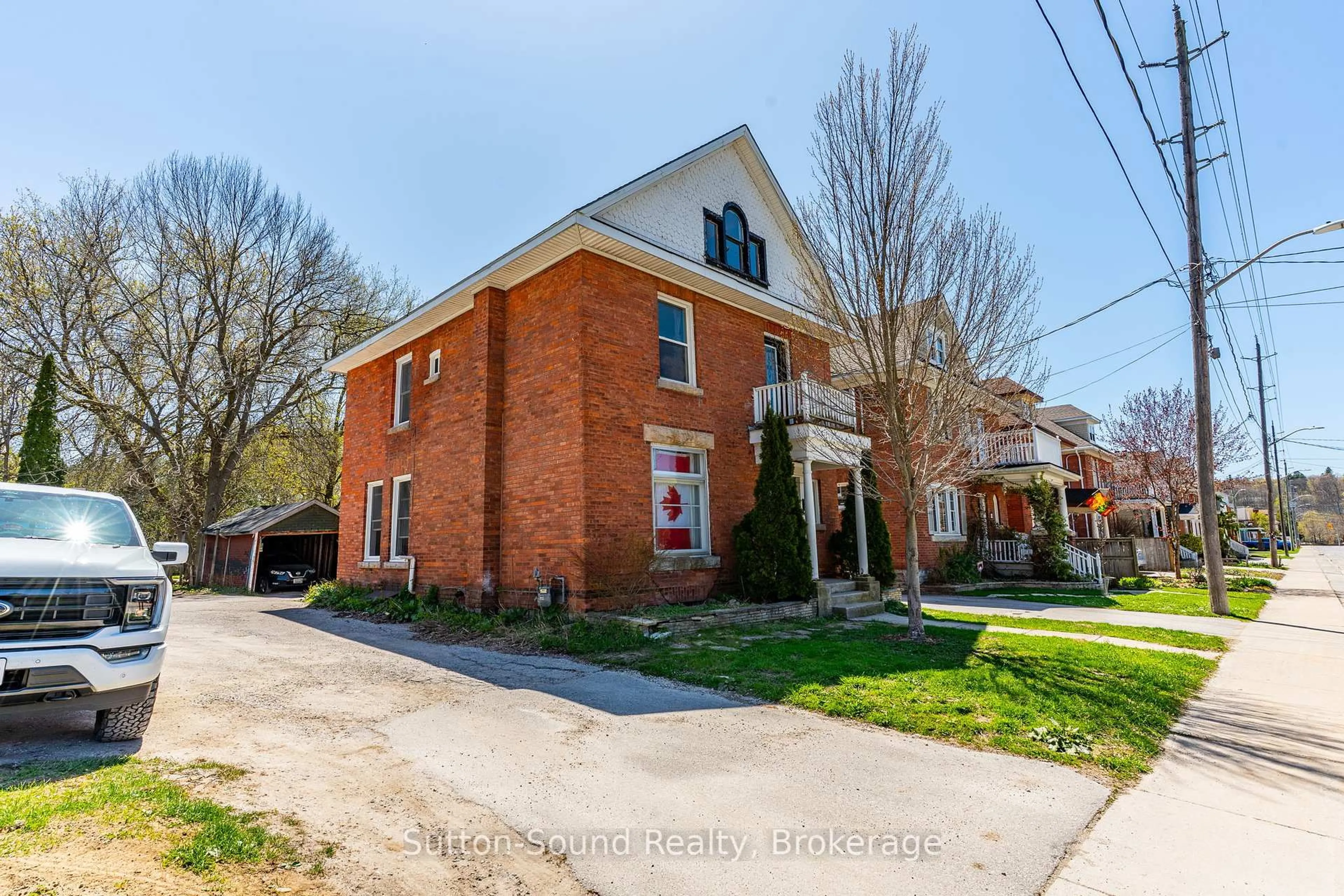 Home with brick exterior material, street for 353 6th St, Owen Sound Ontario N4K 1G1