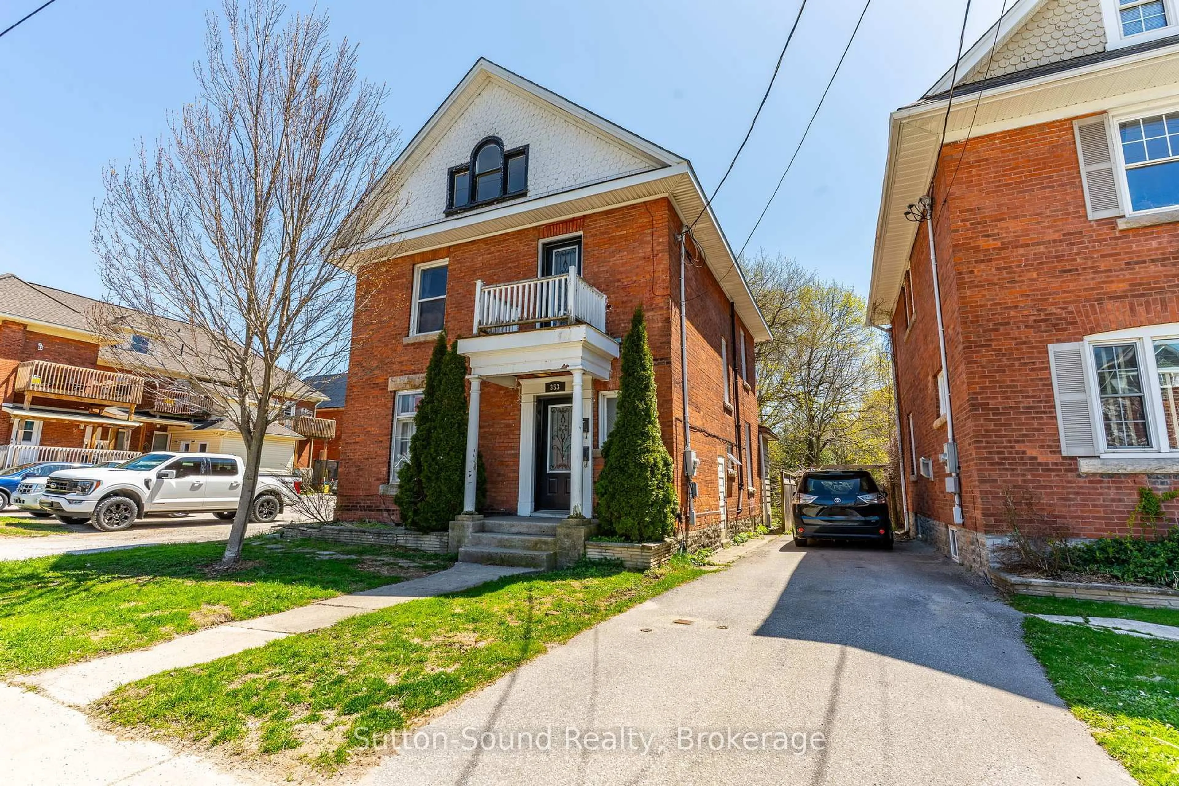 Home with brick exterior material, street for 353 6th St, Owen Sound Ontario N4K 1G1