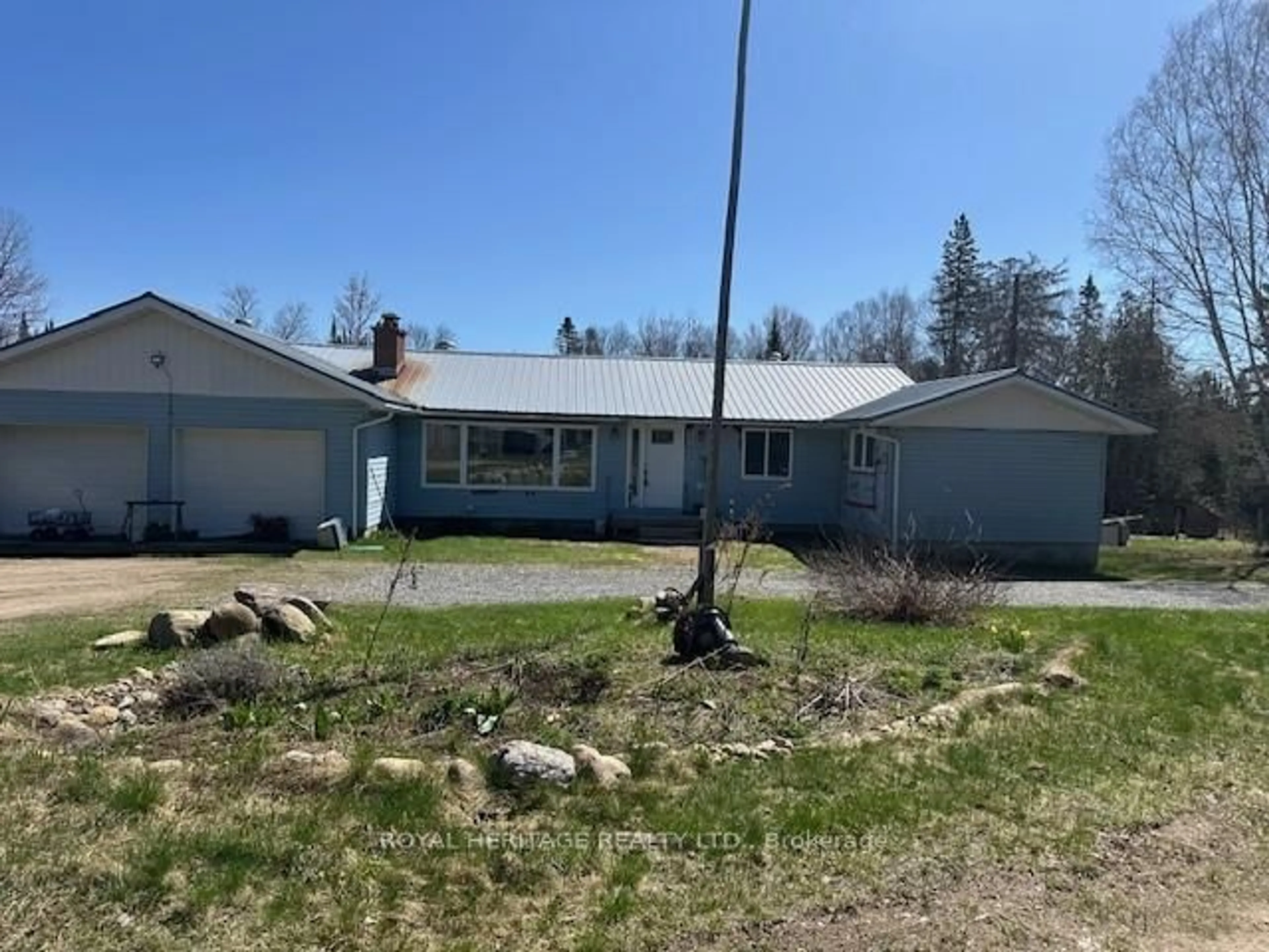 A pic from outside/outdoor area/front of a property/back of a property/a pic from drone, street for 3870 EAGLE LAKE Rd, South River Ontario P0A 1X0