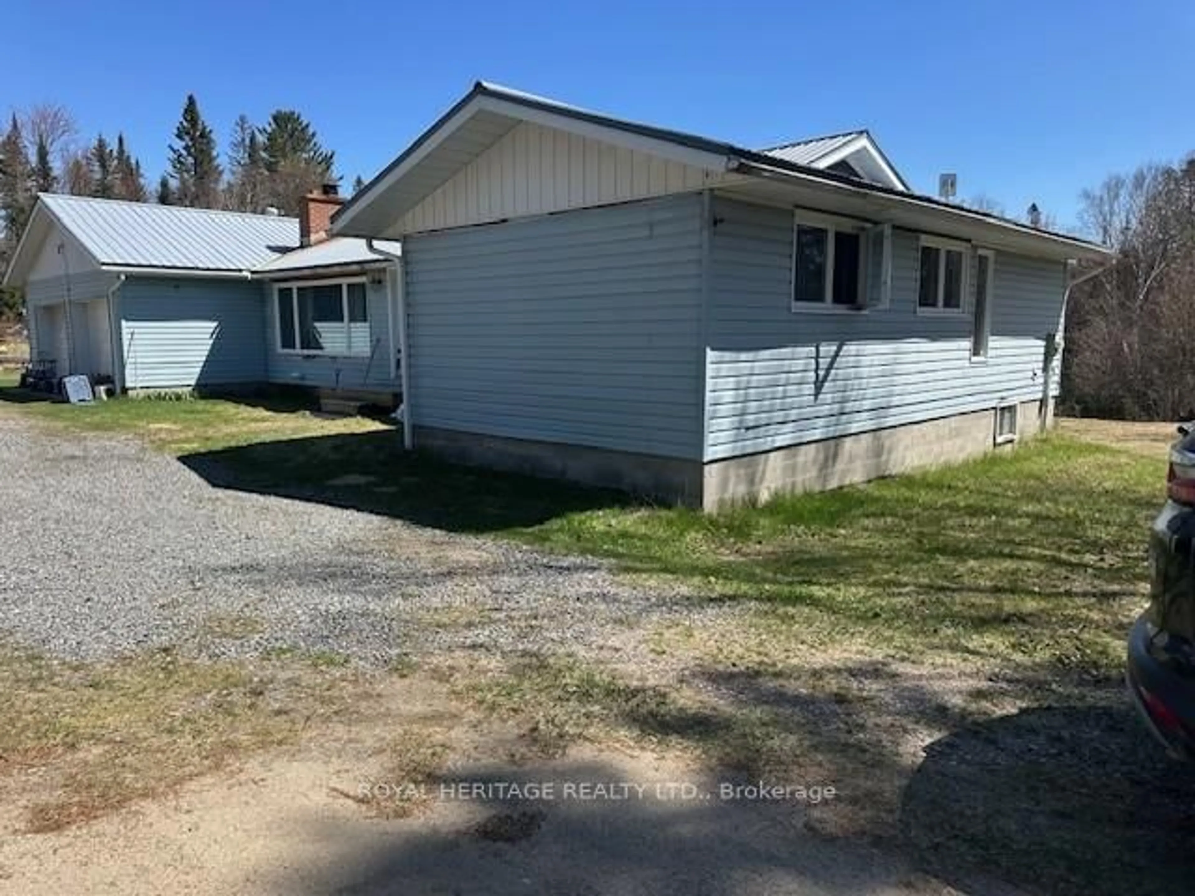 A pic from outside/outdoor area/front of a property/back of a property/a pic from drone, street for 3870 EAGLE LAKE Rd, South River Ontario P0A 1X0