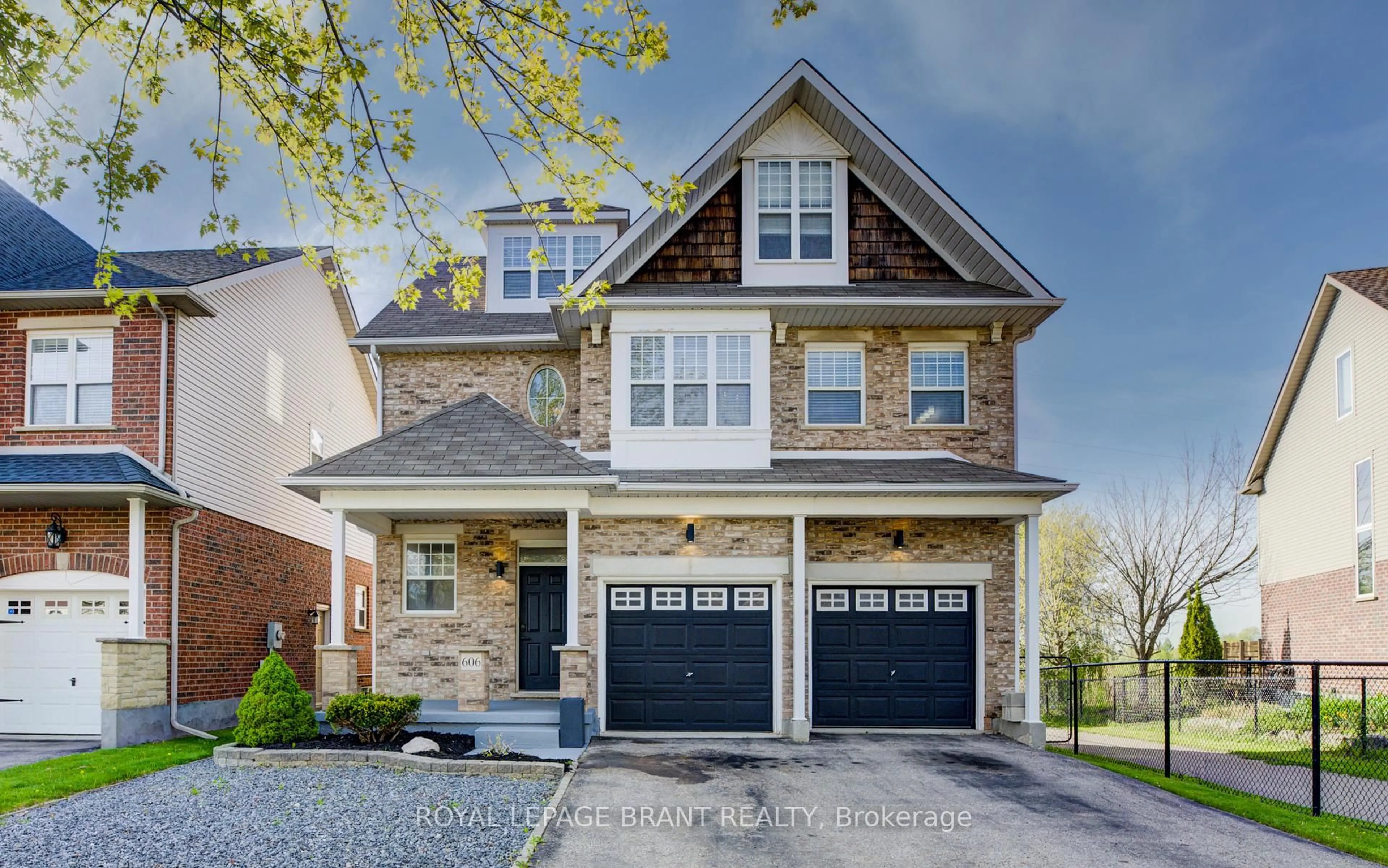Home with brick exterior material, street for 606 Frieburg Dr, Waterloo Ontario N2T 2Y4