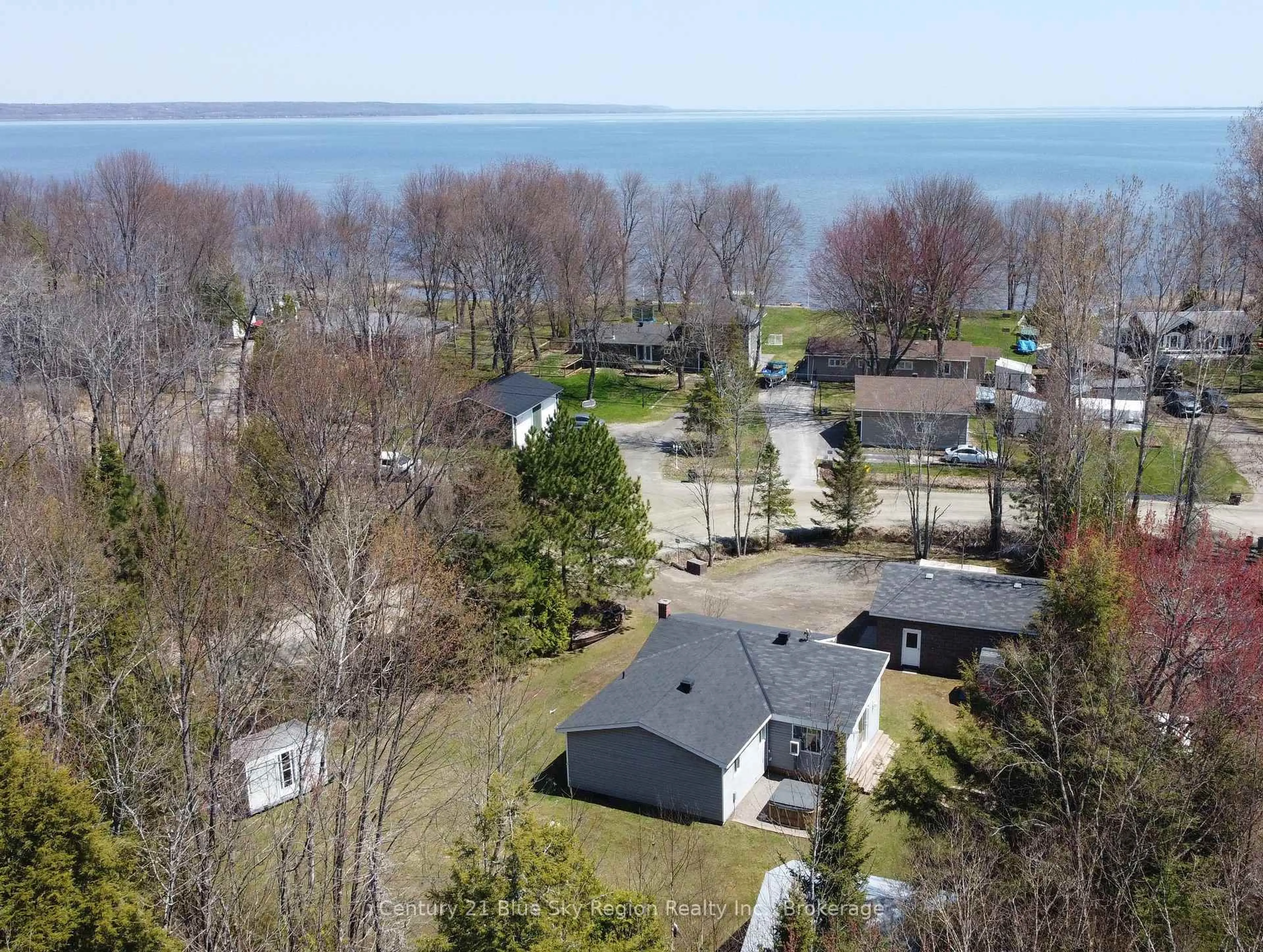 A pic from outside/outdoor area/front of a property/back of a property/a pic from drone, water/lake/river/ocean view for 1566 Jocko Point Rd, North Bay Ontario P1B 8G5