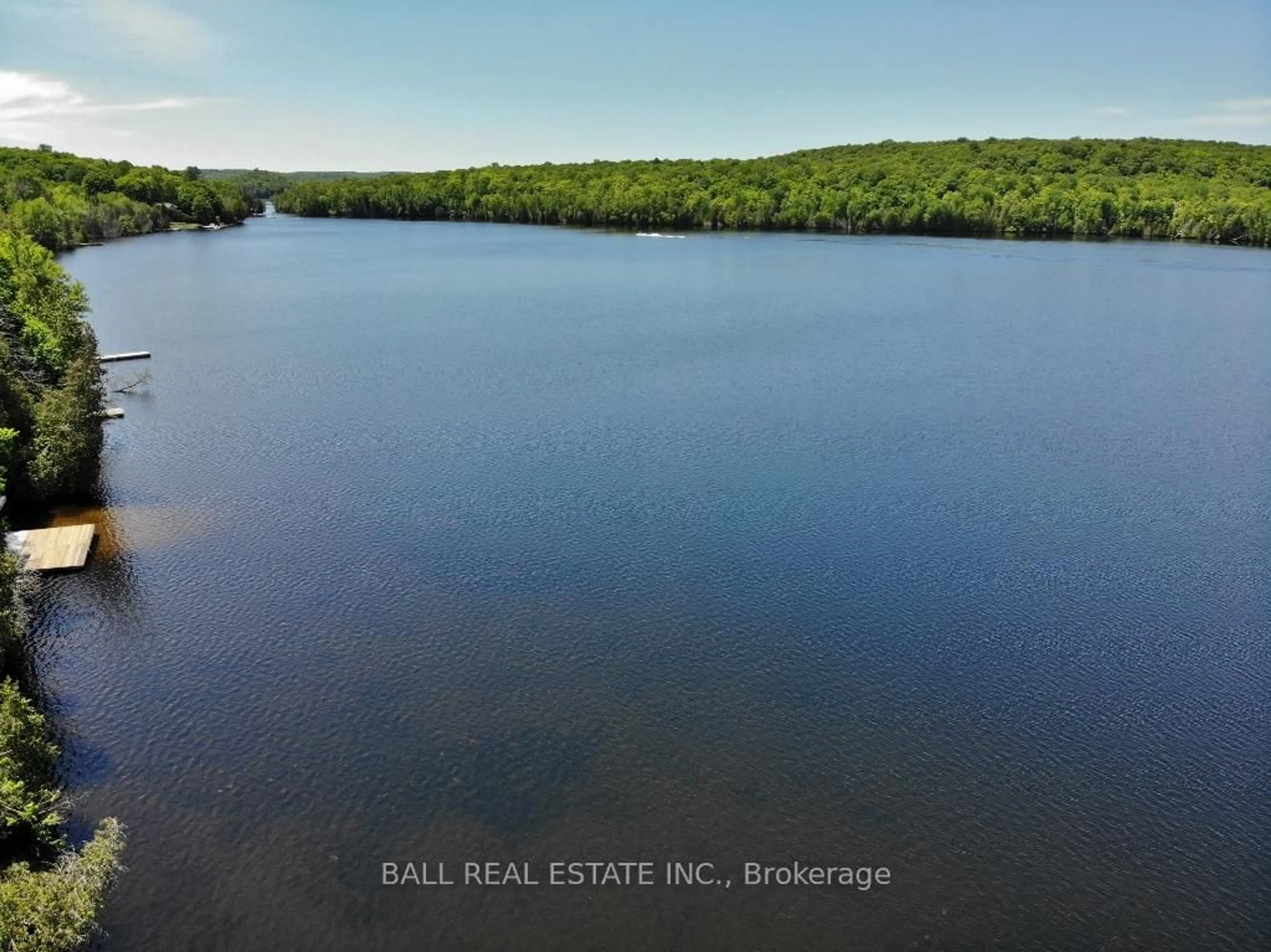 A pic from outside/outdoor area/front of a property/back of a property/a pic from drone, water/lake/river/ocean view for 1805 McGillivray Rd, Highlands East Ontario K0L 1C0