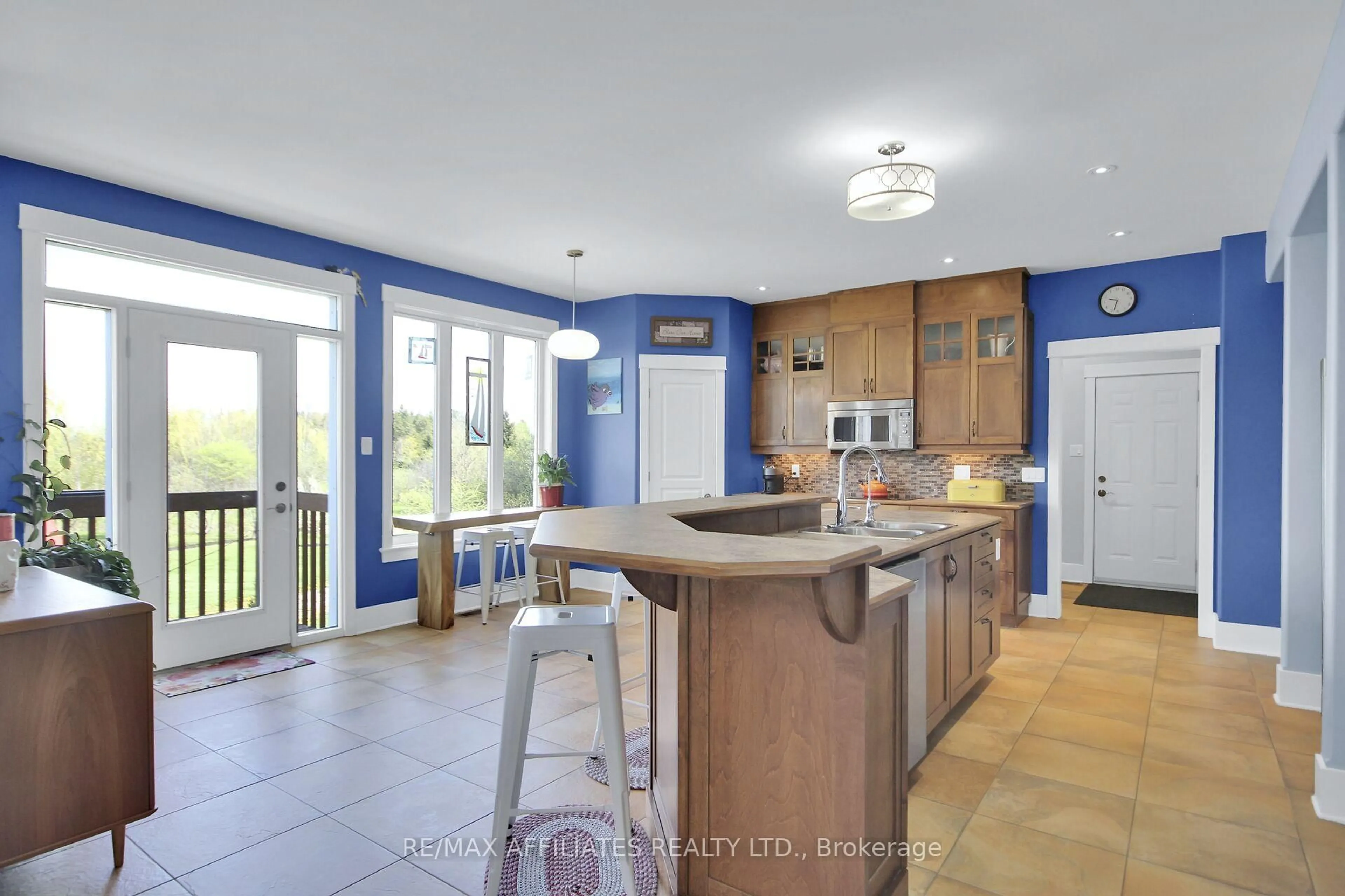 Open concept kitchen, ceramic/tile floor for 500 Bradbury Crt, Ottawa Ontario K2W 0A1