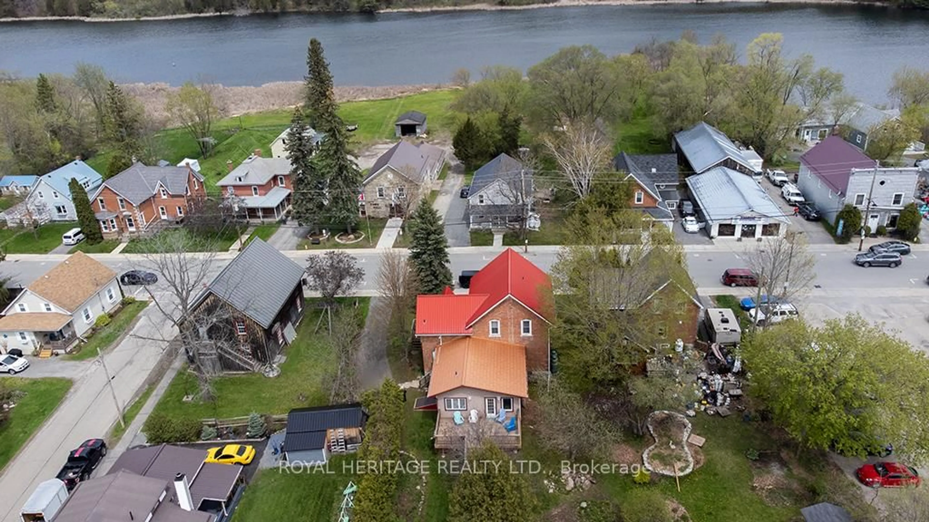 A pic from outside/outdoor area/front of a property/back of a property/a pic from drone, water/lake/river/ocean view for 27 Bedford St, Westport Ontario K0G 1X0