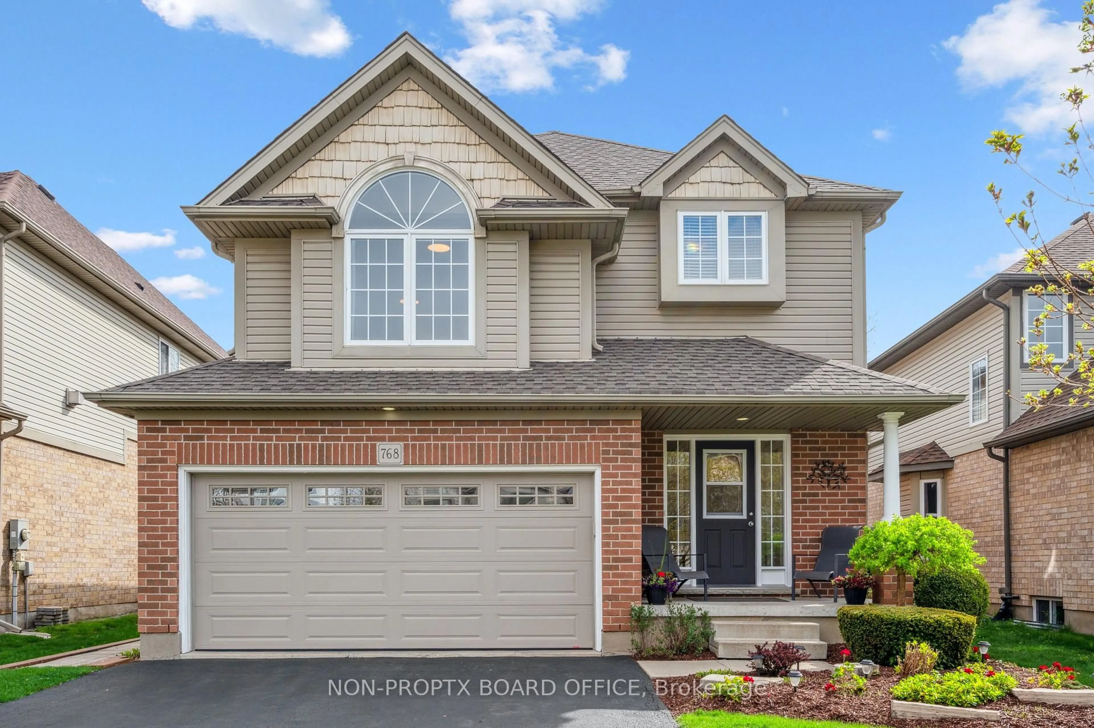 Home with brick exterior material, street for 768 Shediac Cres, Waterloo Ontario N2K 4M4