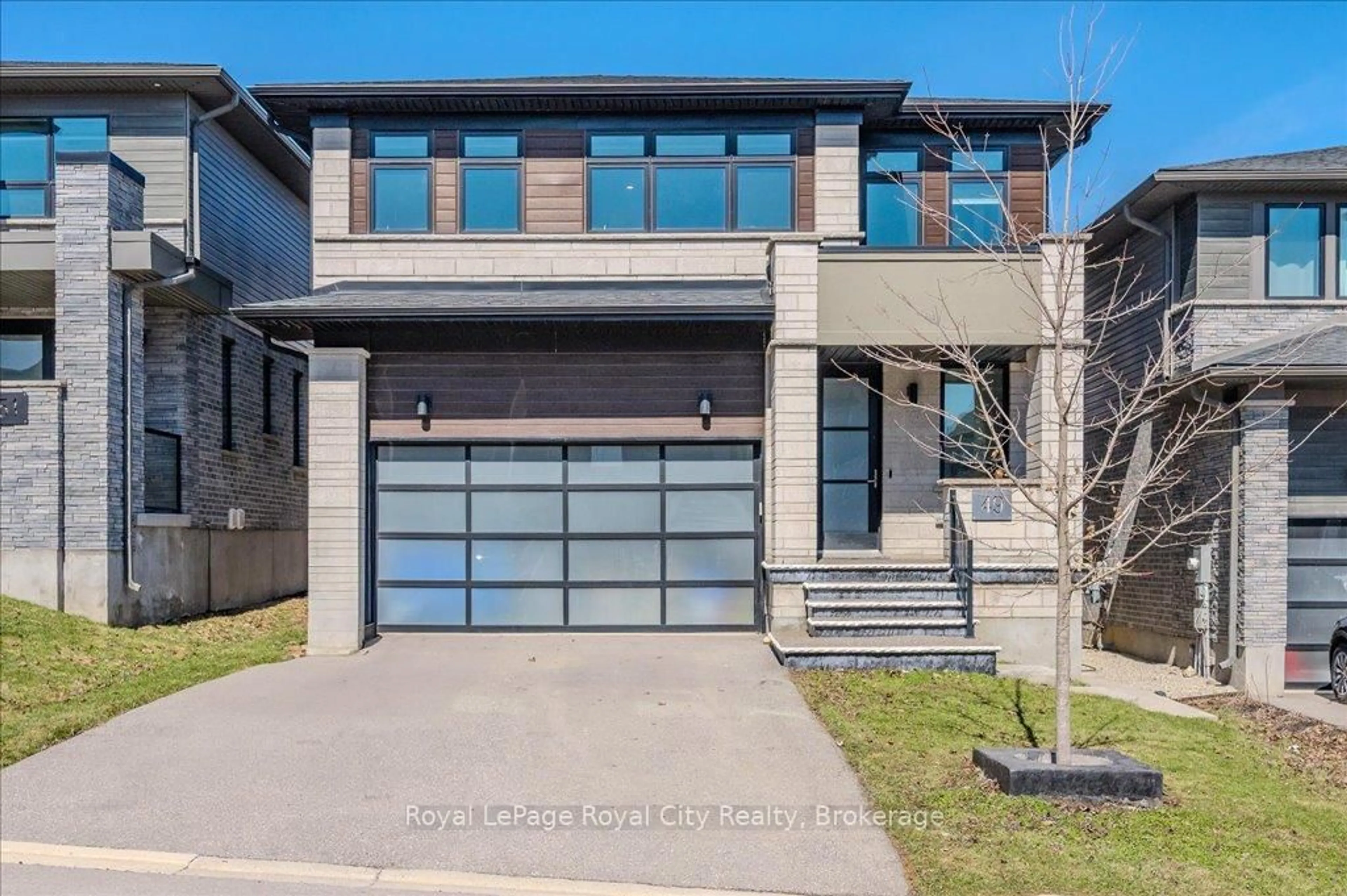 Home with brick exterior material, street for 49 Ryder Ave, Guelph Ontario N1G 0H1