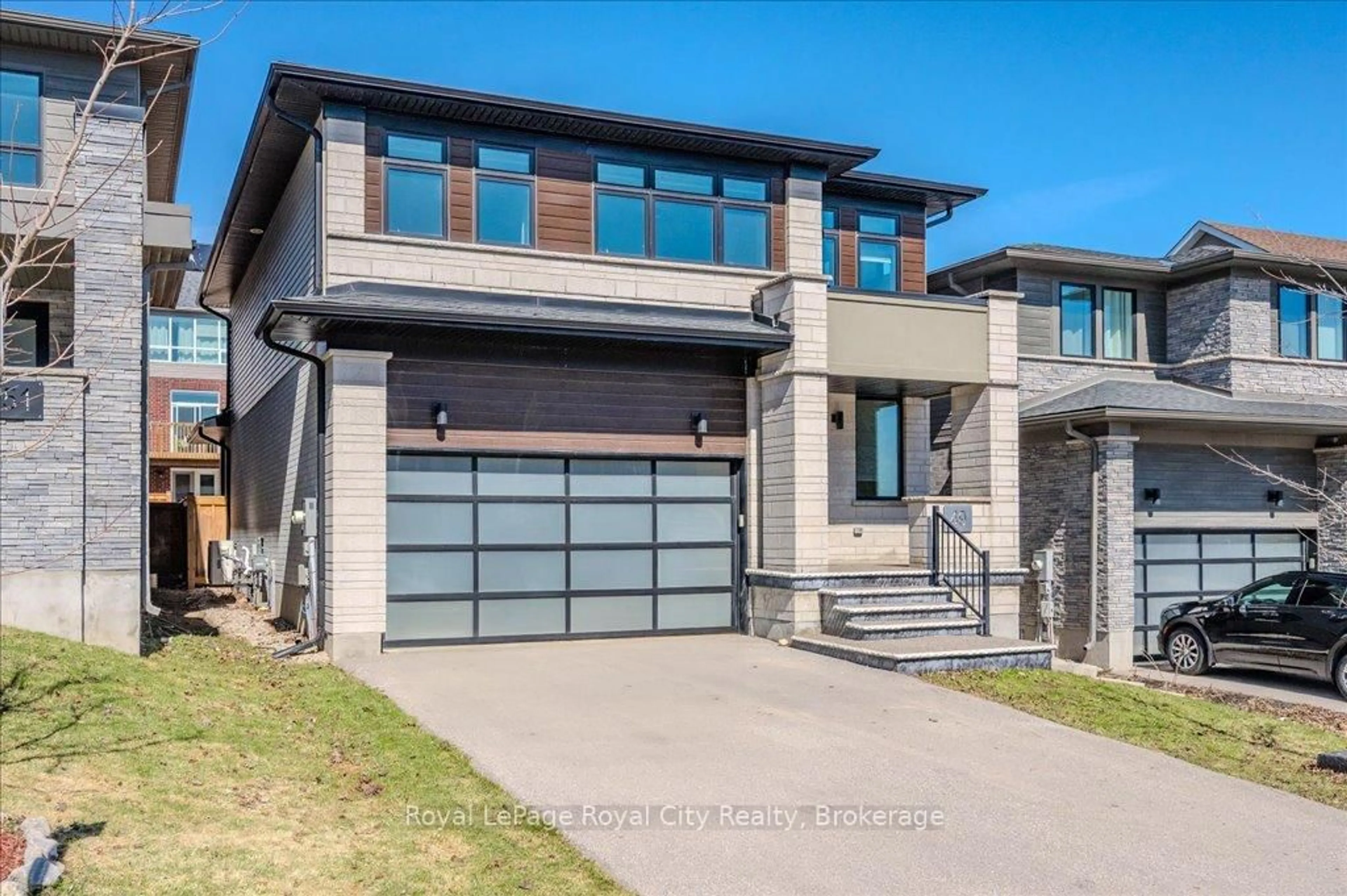 Home with brick exterior material, street for 49 Ryder Ave, Guelph Ontario N1G 0H1