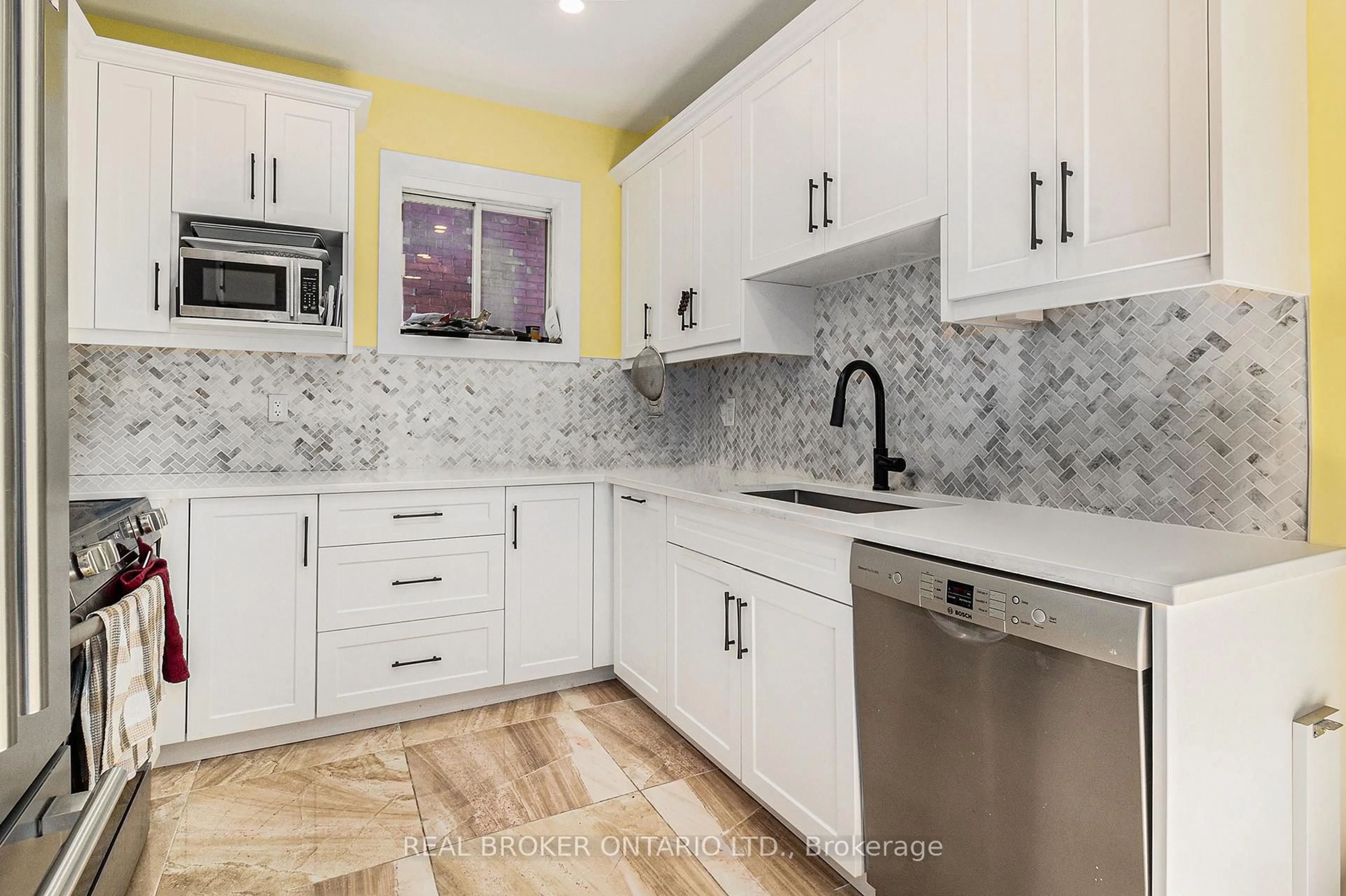 Open concept kitchen, ceramic/tile floor for 120 Waverley St, Ottawa Ontario K2P 0V4
