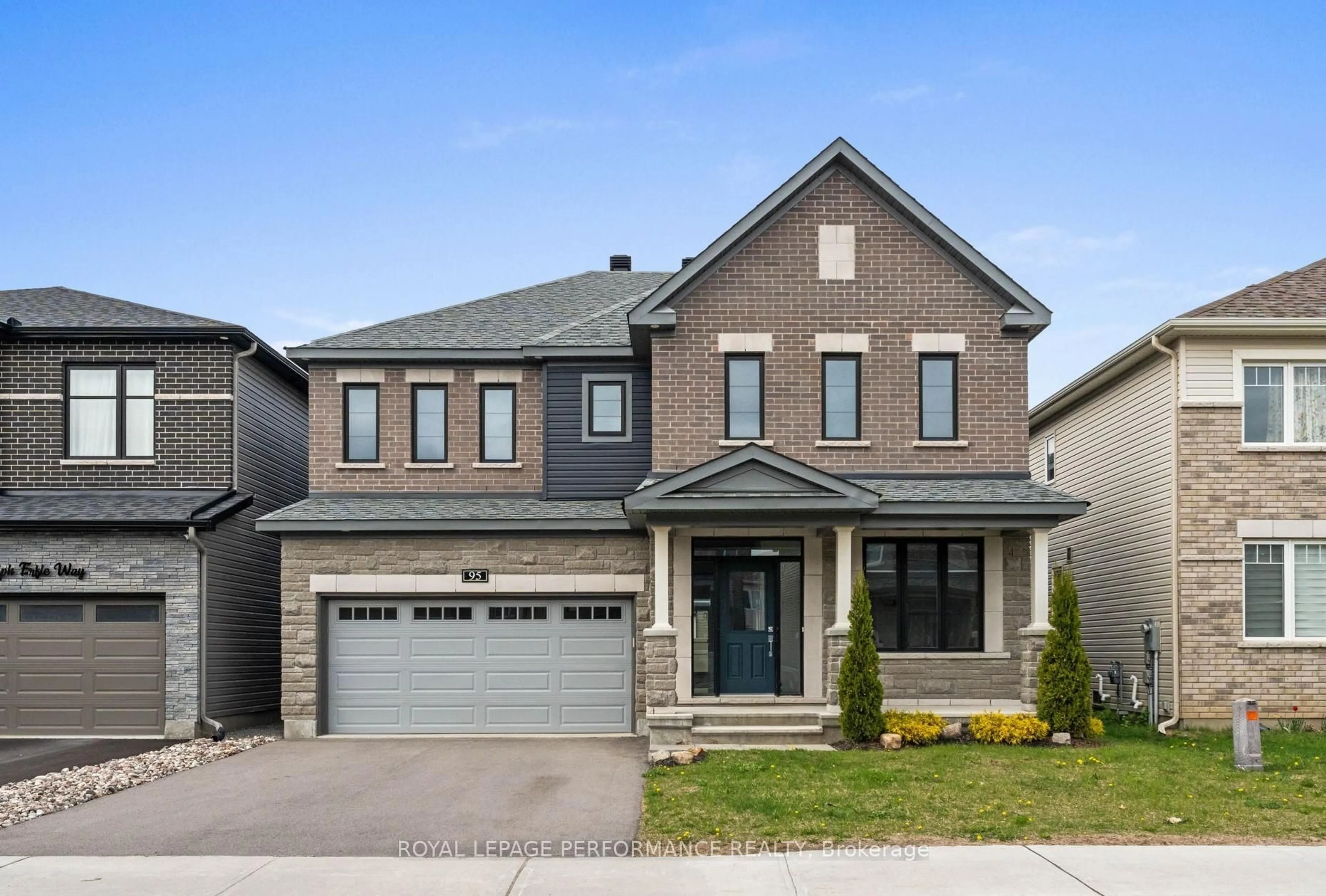 Home with brick exterior material, street for 95 RALPH ERFLE Way, Ottawa Ontario K2J 6W2