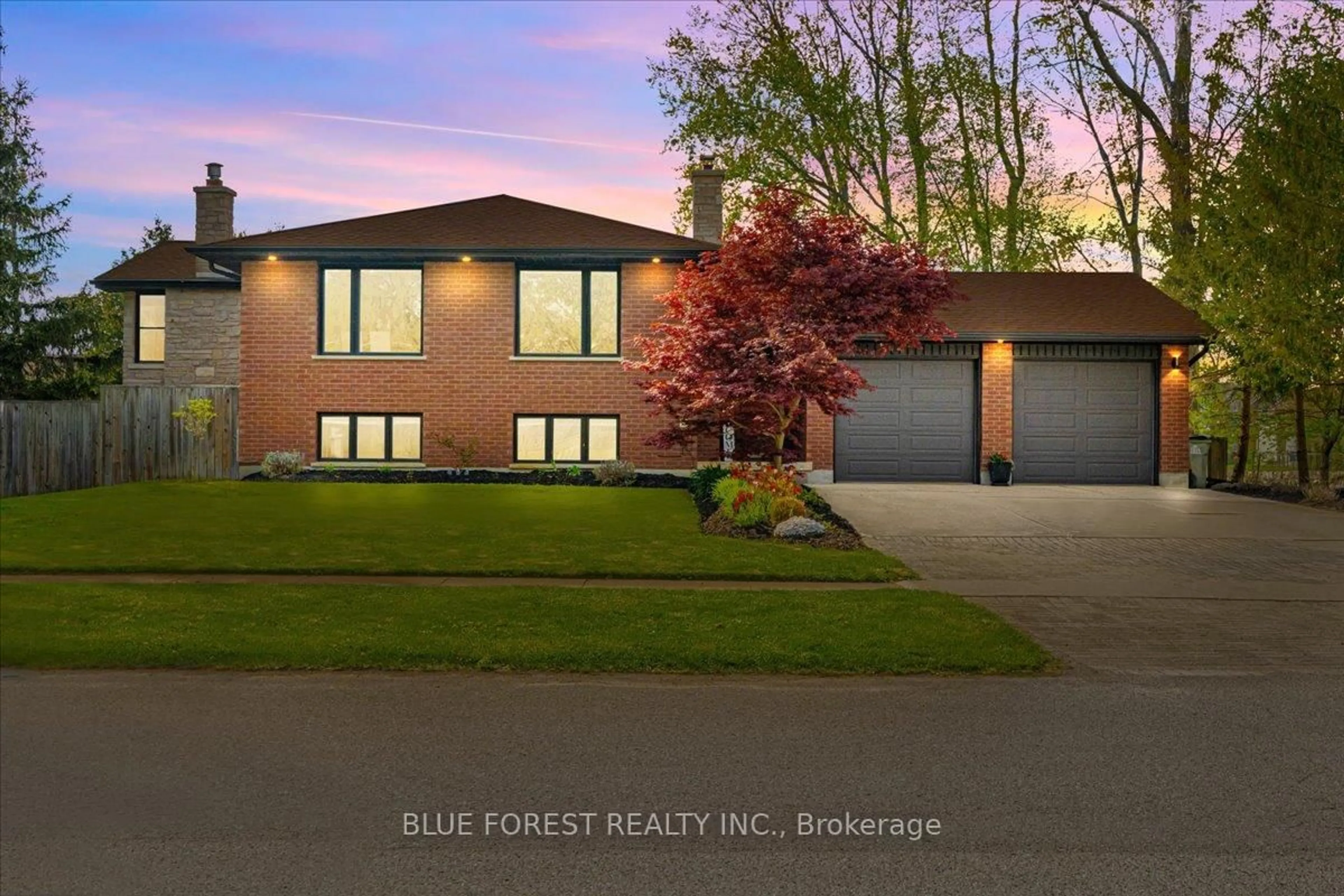 Home with brick exterior material, forest/trees view for 674 Lions Park Dr, Strathroy-Caradoc Ontario N0L 1W0