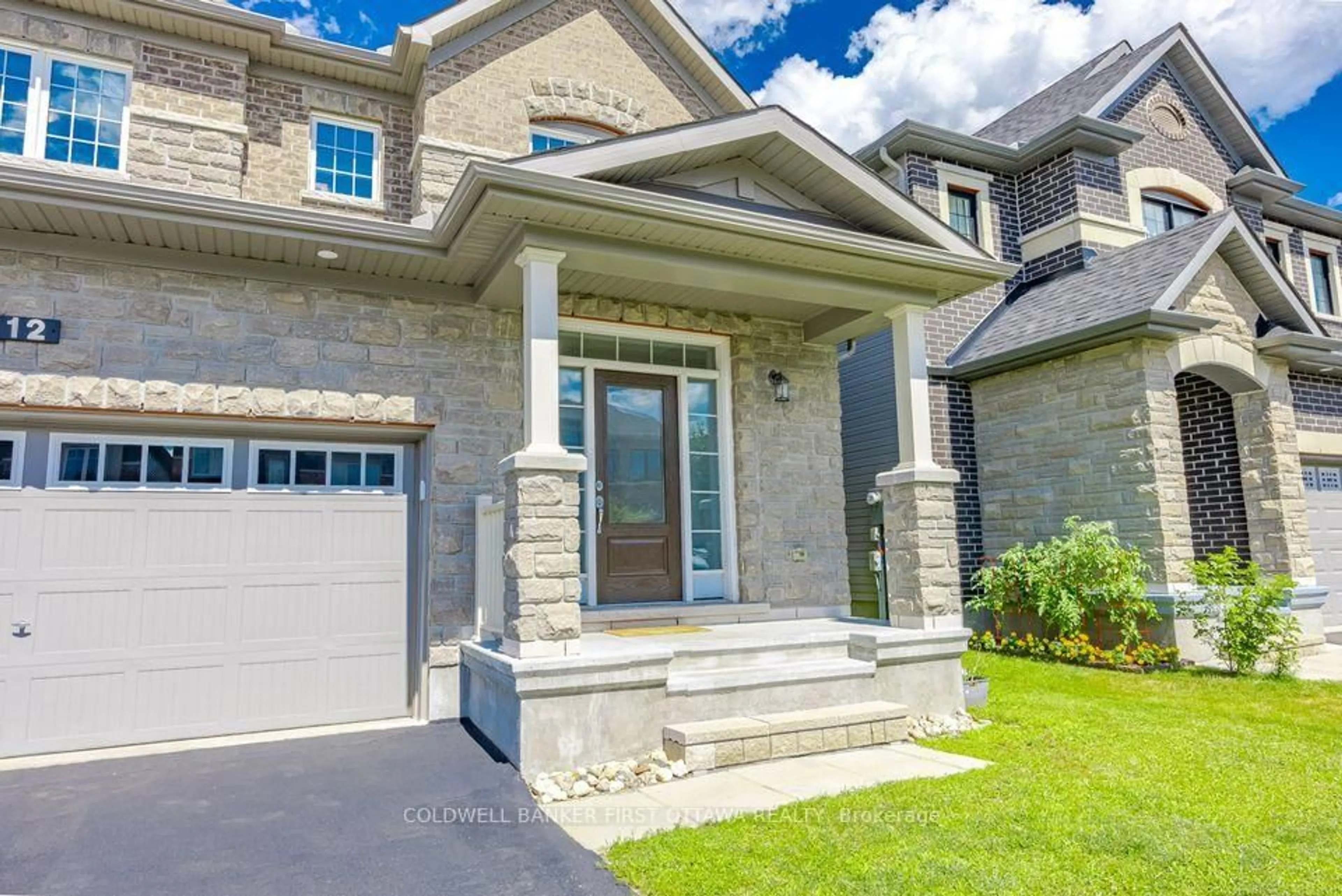 Home with brick exterior material, street for 12 HAWKS LANDING Cres, Stittsville Ontario K2S 1W1