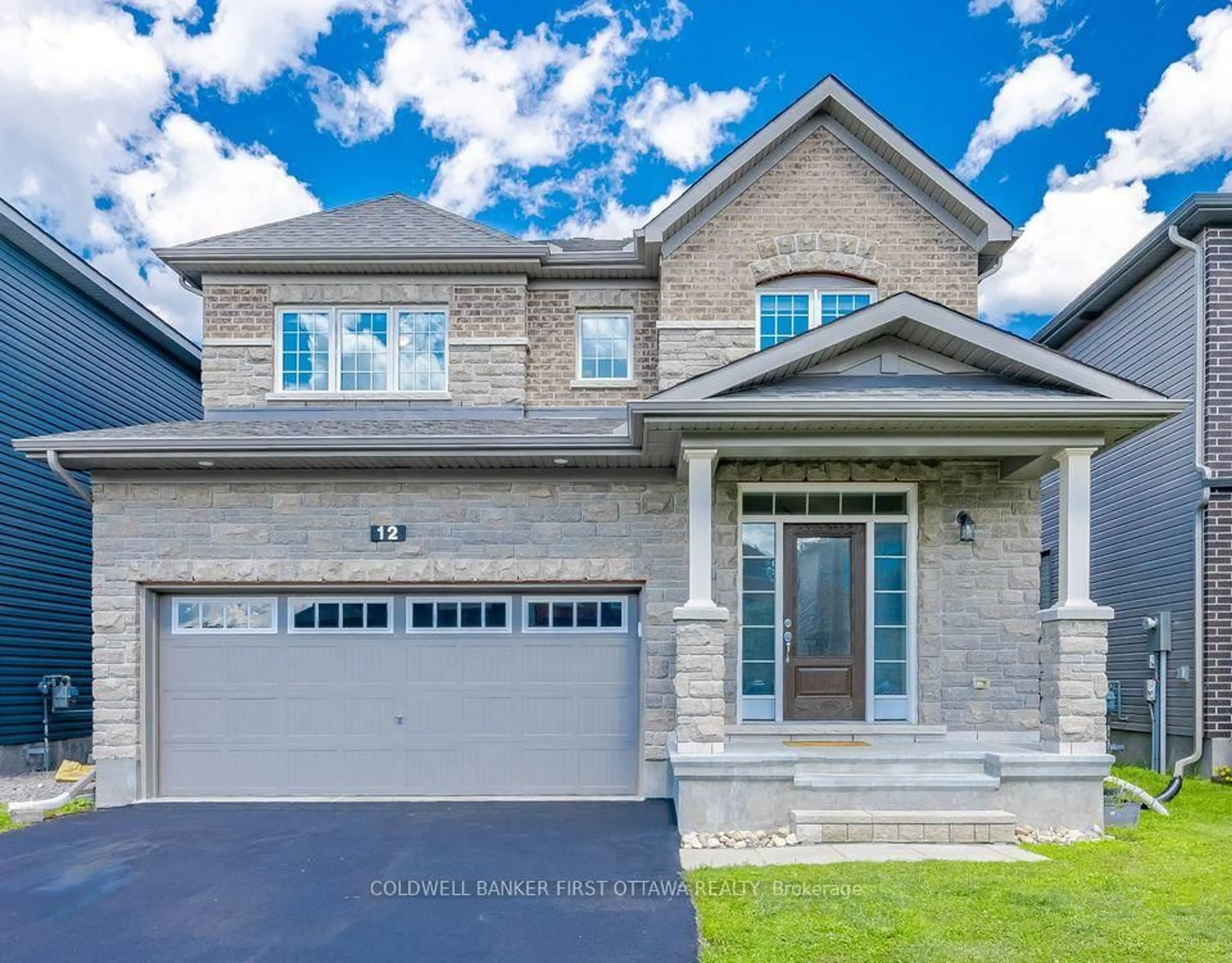 Home with brick exterior material, street for 12 HAWKS LANDING Cres, Stittsville Ontario K2S 1W1