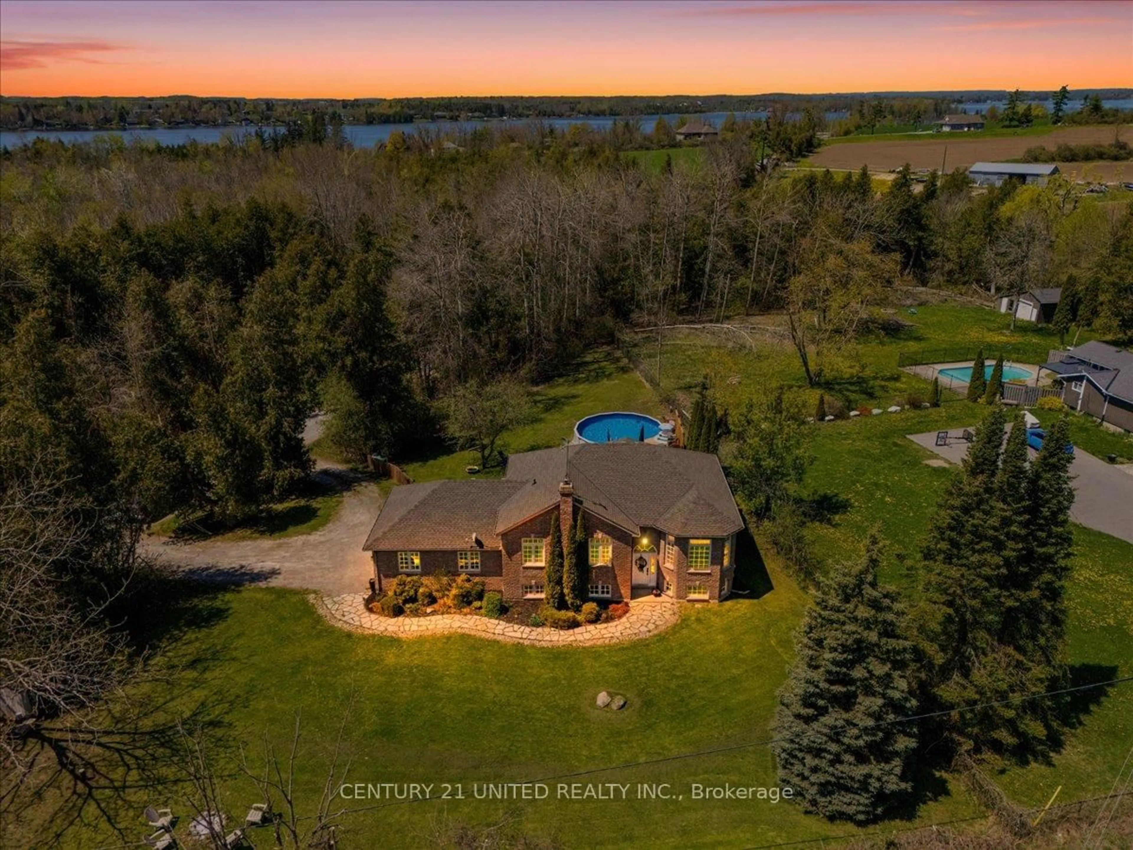 A pic from outside/outdoor area/front of a property/back of a property/a pic from drone, water/lake/river/ocean view for 1595 Poplar Point Rd, Selwyn Ontario K9J 6X5