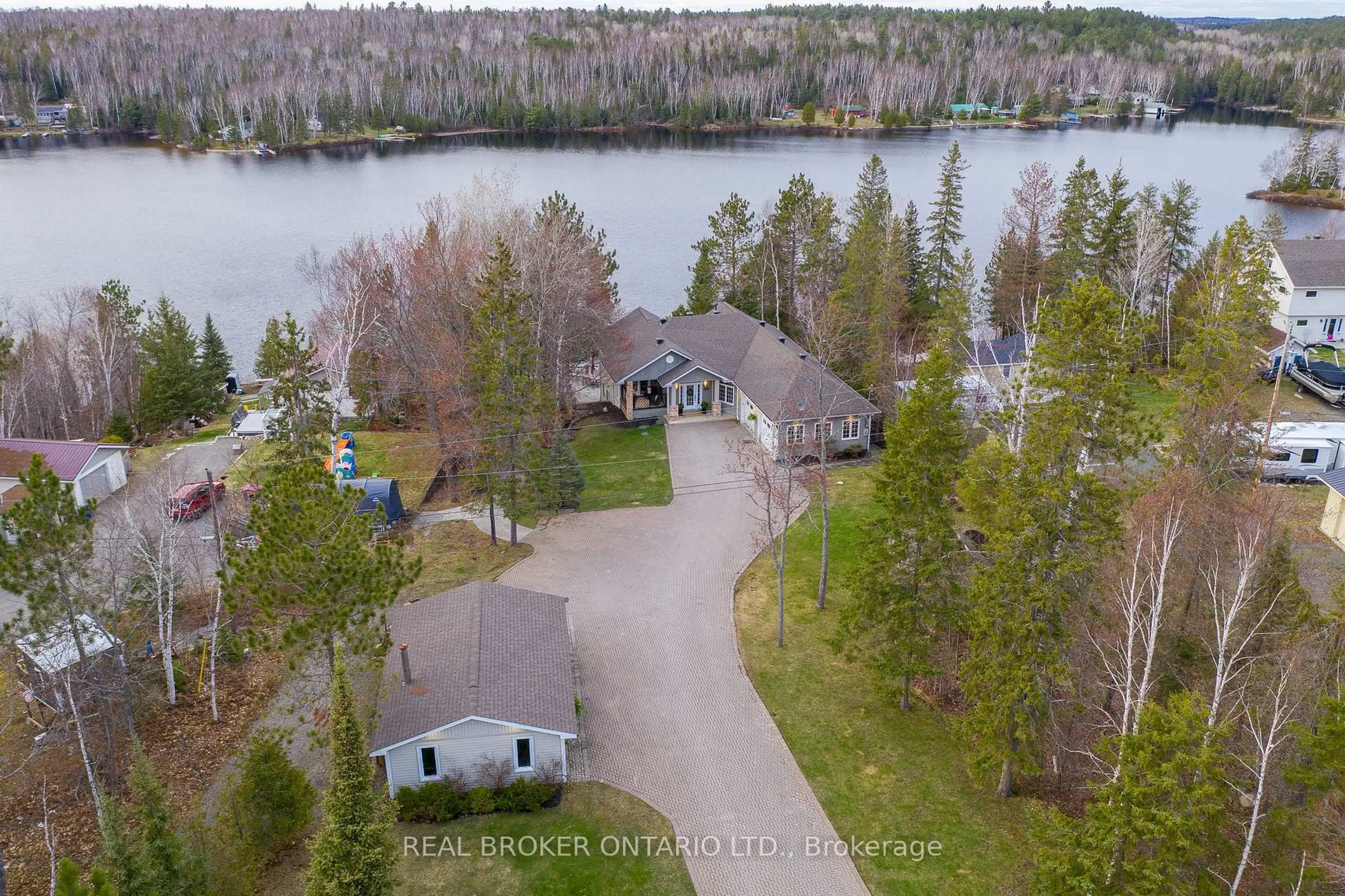 A pic from outside/outdoor area/front of a property/back of a property/a pic from drone, water/lake/river/ocean view for 100 Riverview Rd, Markstay-Warren Ontario P0M 3C0