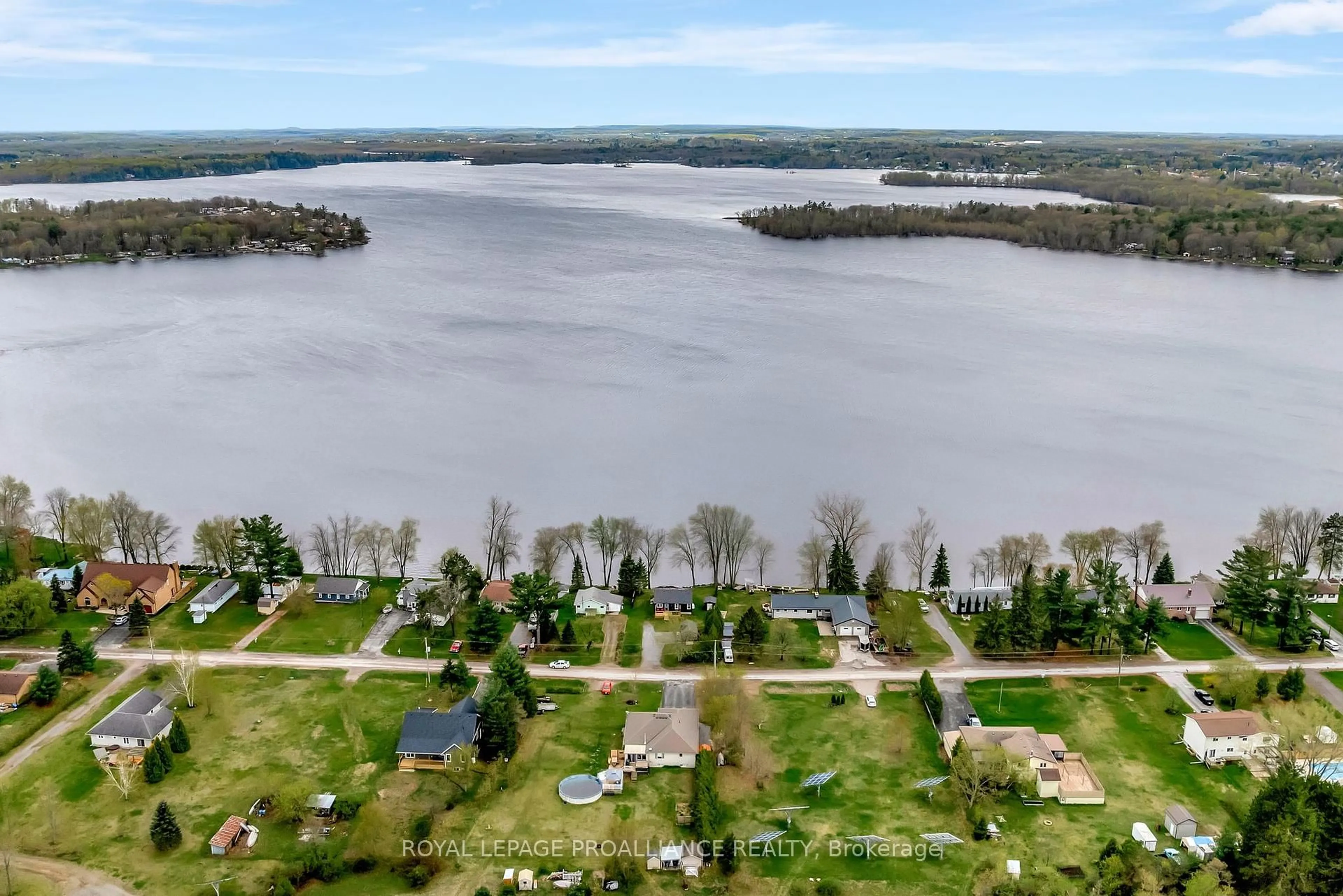 A pic from outside/outdoor area/front of a property/back of a property/a pic from drone, water/lake/river/ocean view for 136 CHARLES Rd, Tweed Ontario K0K 3J0
