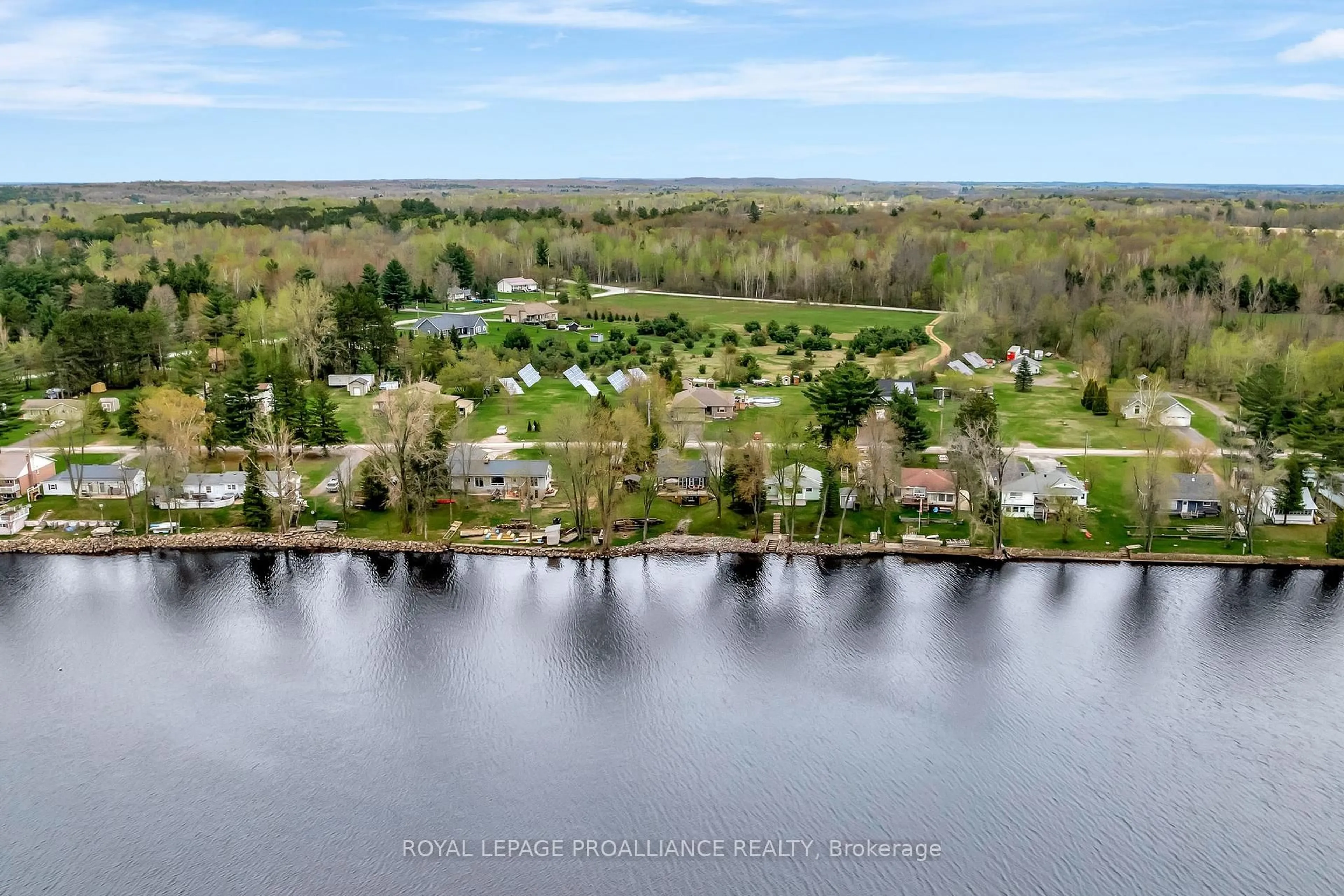 A pic from outside/outdoor area/front of a property/back of a property/a pic from drone, water/lake/river/ocean view for 136 CHARLES Rd, Tweed Ontario K0K 3J0