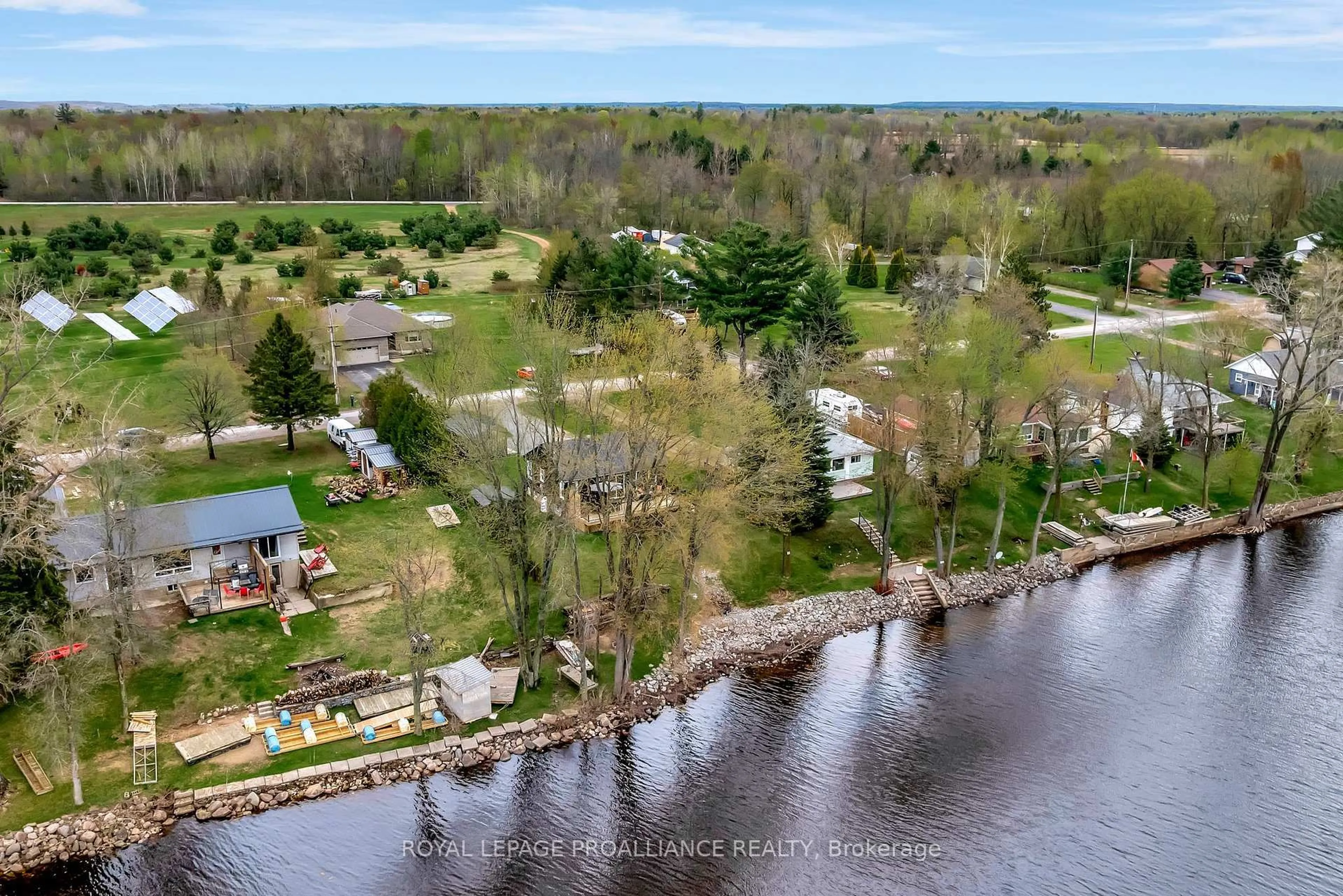 A pic from outside/outdoor area/front of a property/back of a property/a pic from drone, water/lake/river/ocean view for 136 CHARLES Rd, Tweed Ontario K0K 3J0