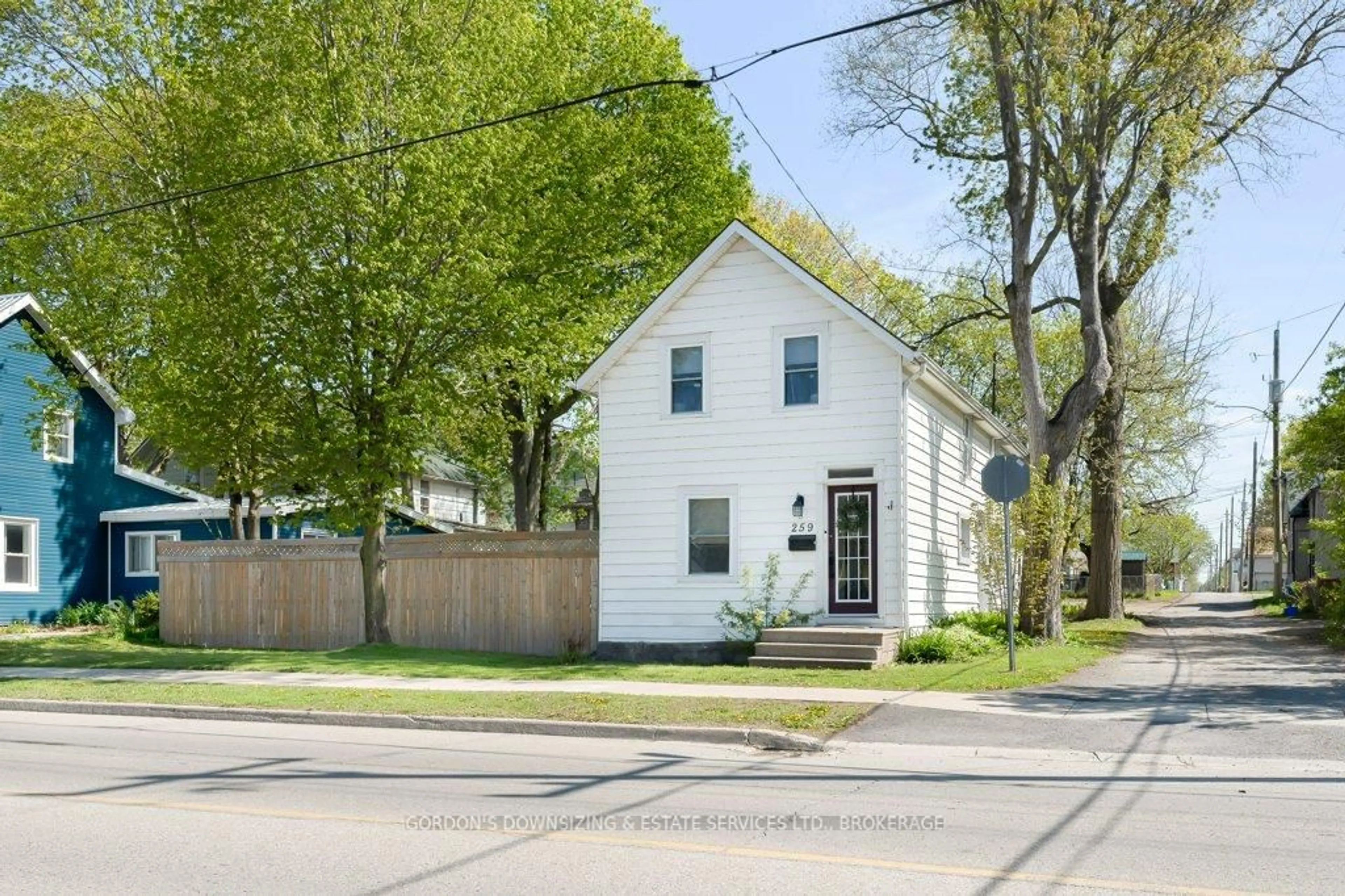 Home with vinyl exterior material, street for 259 Stone St, Gananoque Ontario K7G 1Y7