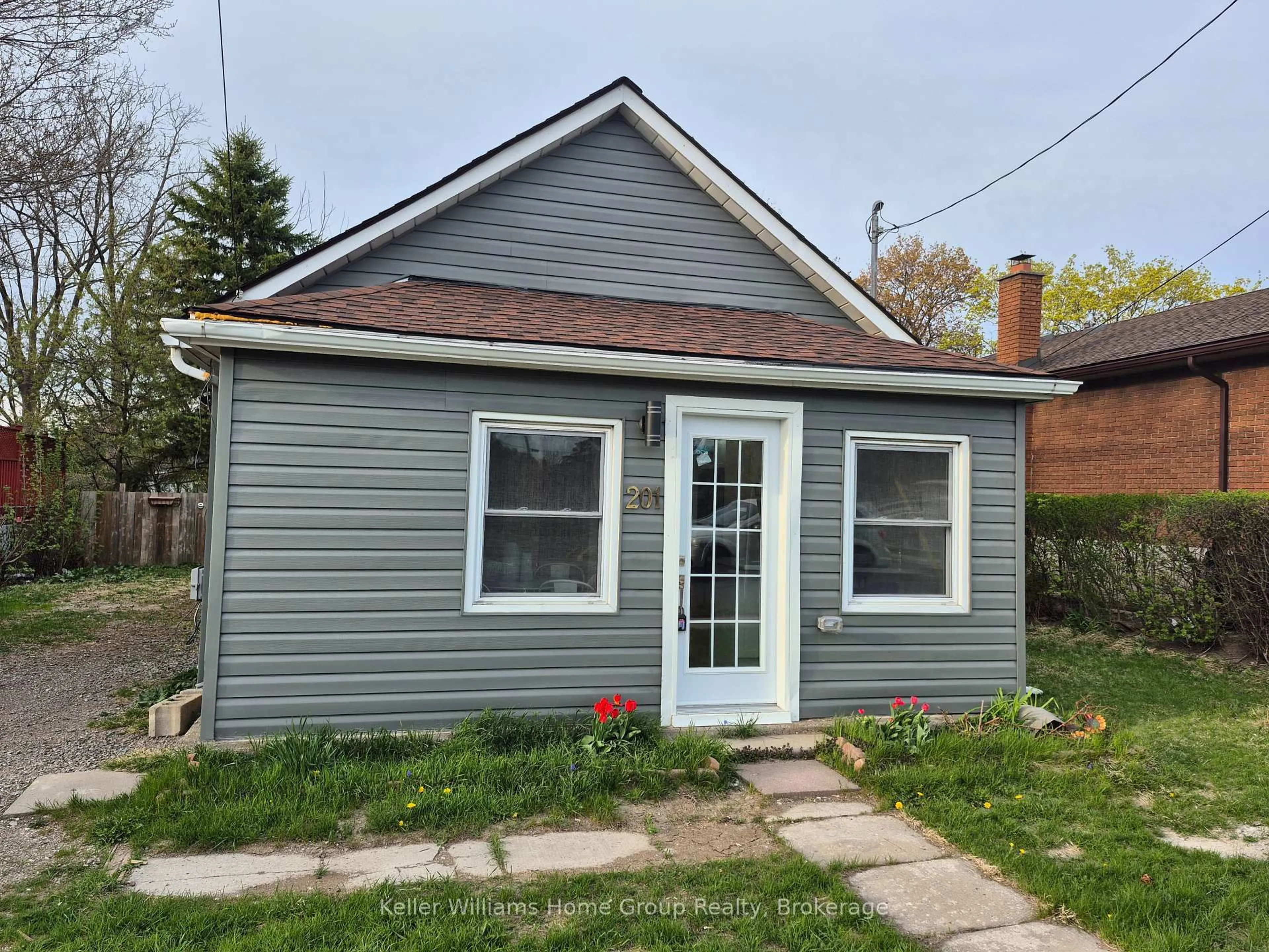 Home with vinyl exterior material, street for 201 Fennell Ave, Hamilton Ontario L9A 1S5