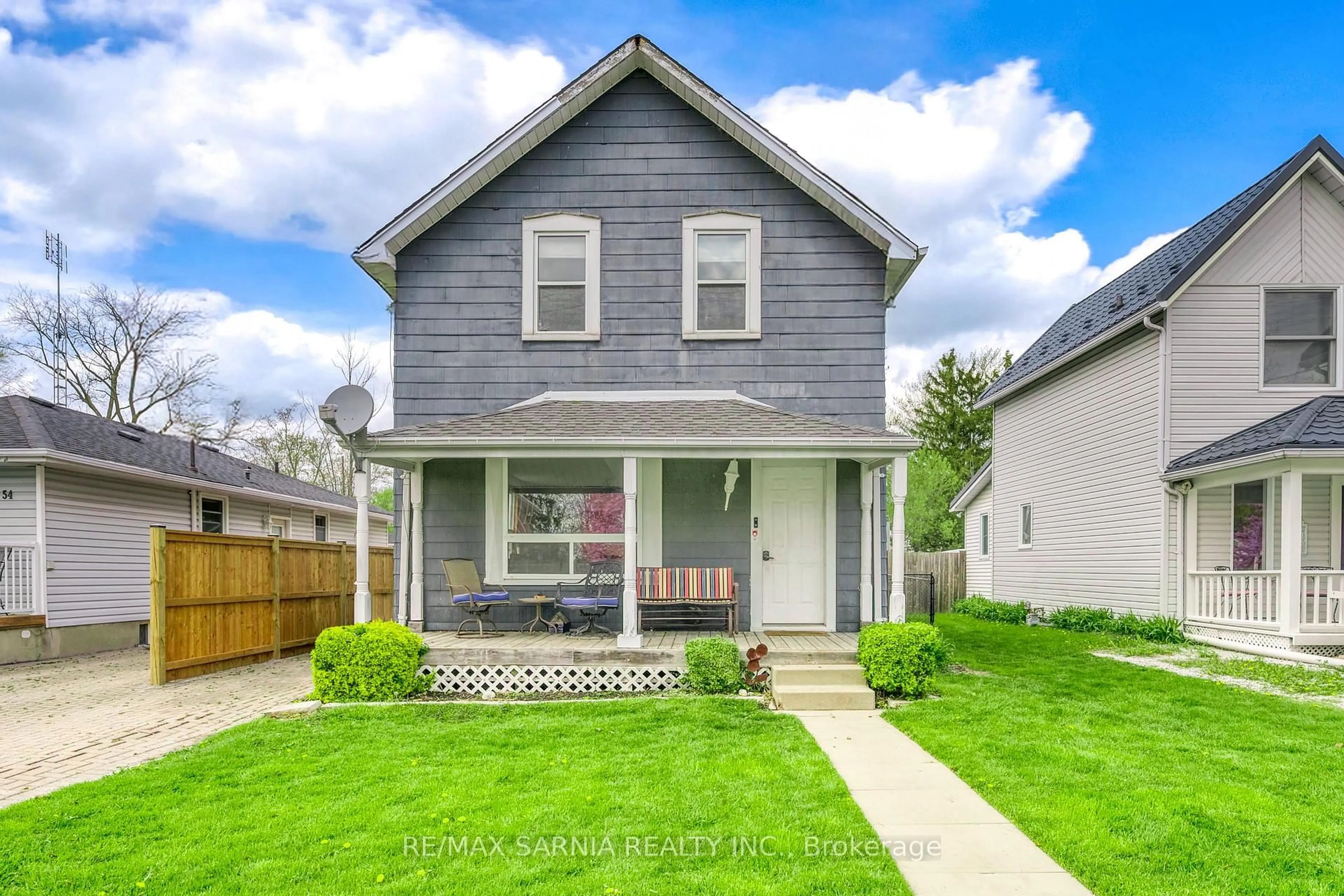 Home with vinyl exterior material, street for 56 MAIN St, St. Clair Ontario N0N 1H0