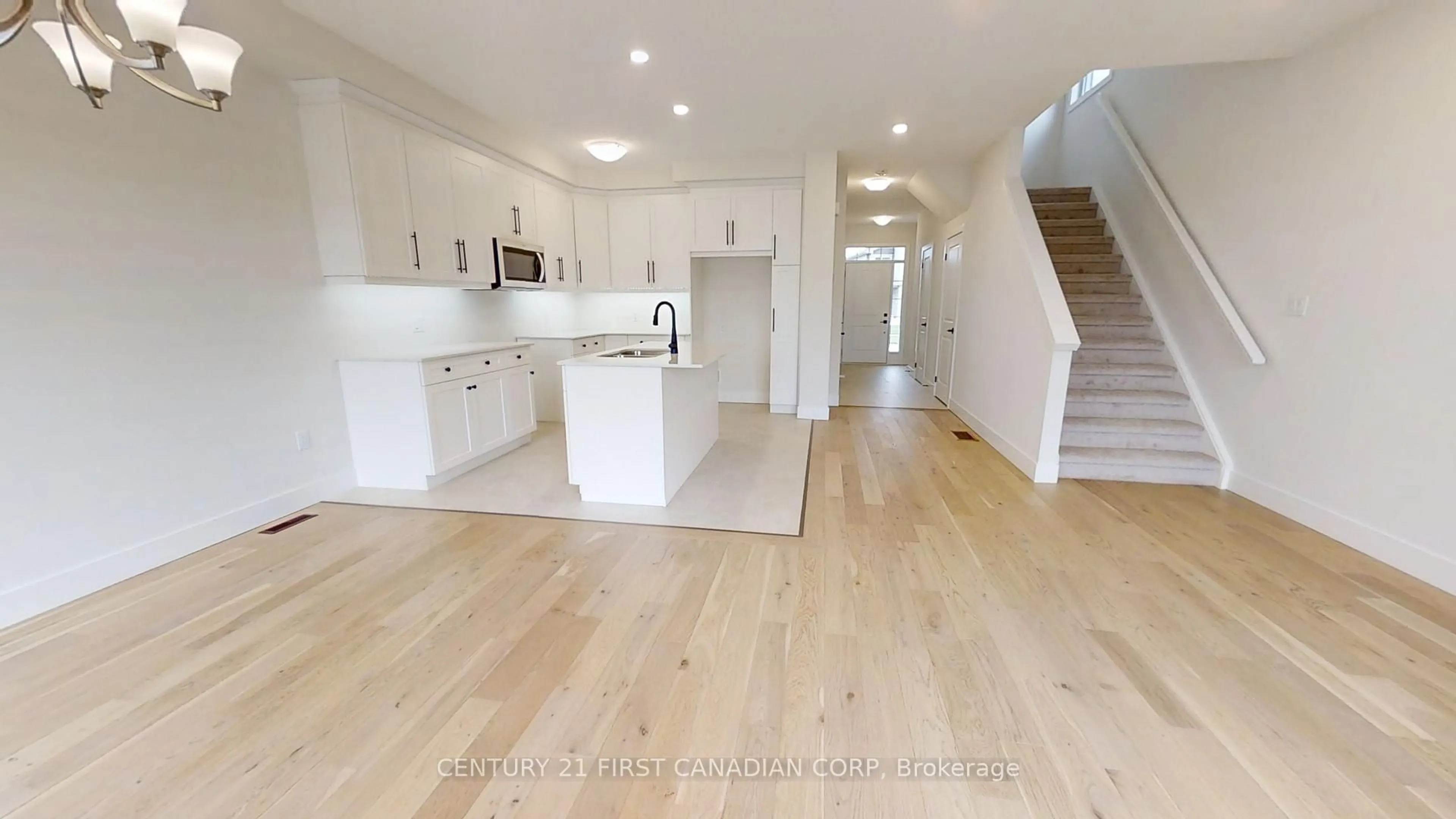 Open concept kitchen, wood/laminate floor for 1960 Evans Blvd #121, London South Ontario N6M 0A2
