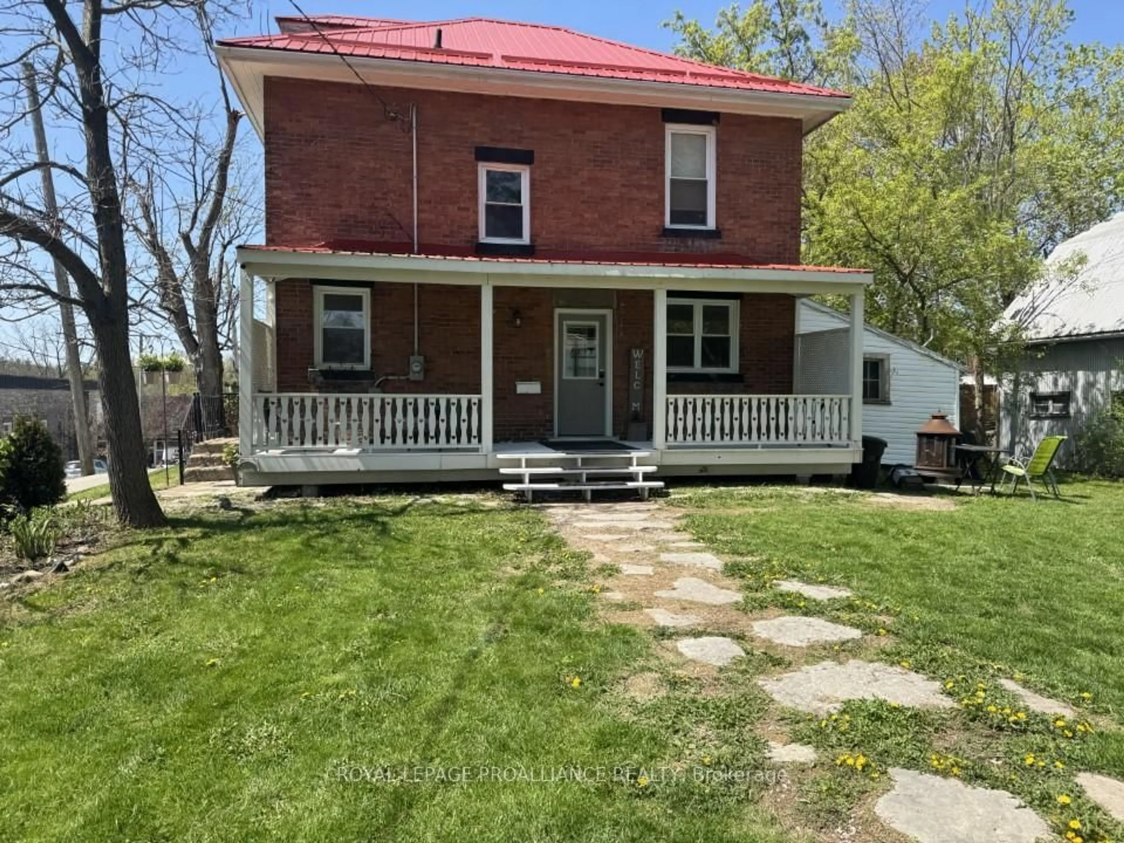 A pic from outside/outdoor area/front of a property/back of a property/a pic from drone, street for 17 Madoc St, Limoges Ontario K0K 2M0